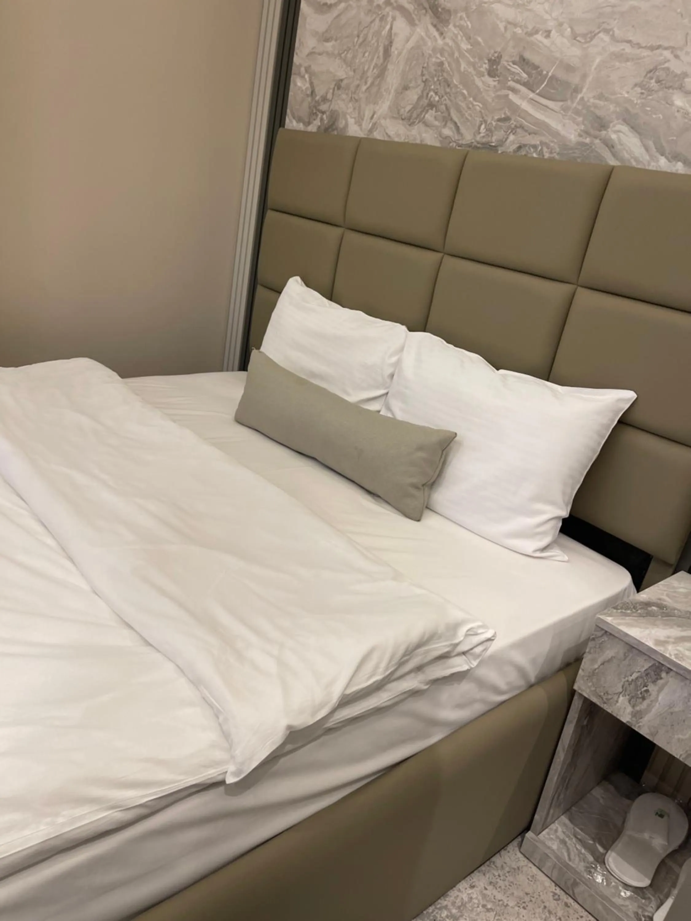 Bed in Aymira Suite Hotel