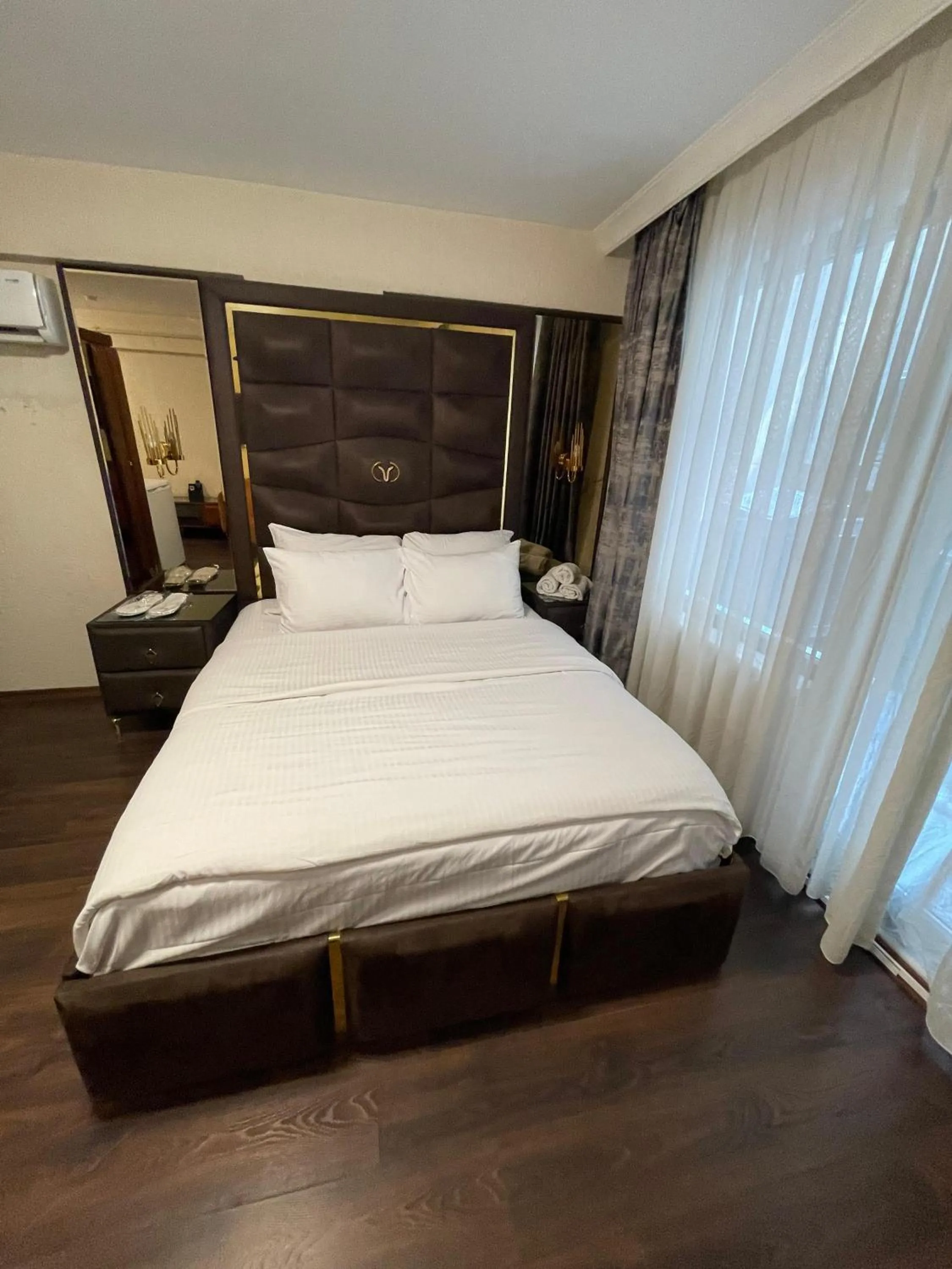 Bed in Aymira Suite Hotel