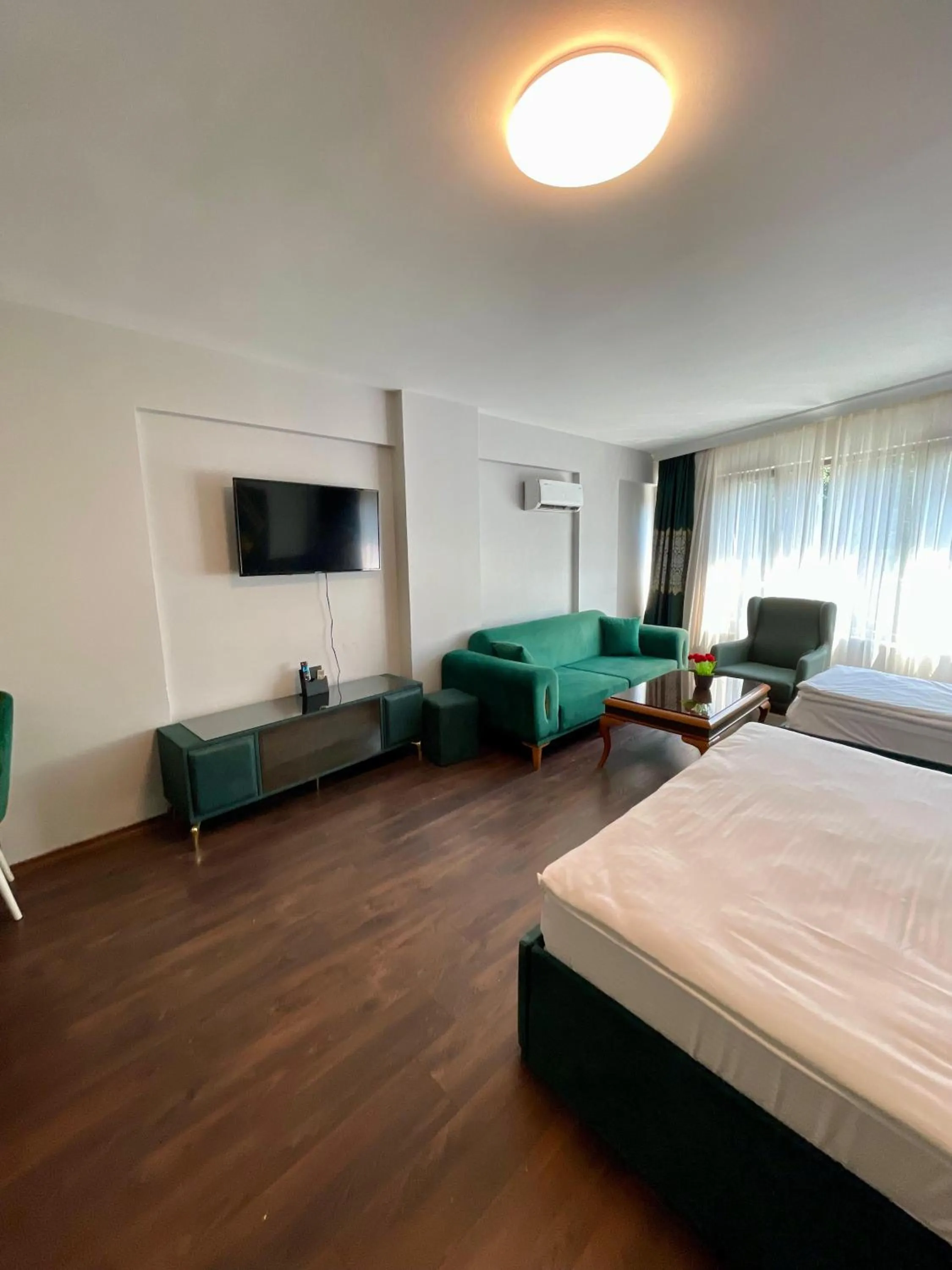 Bed in Aymira Suite Hotel