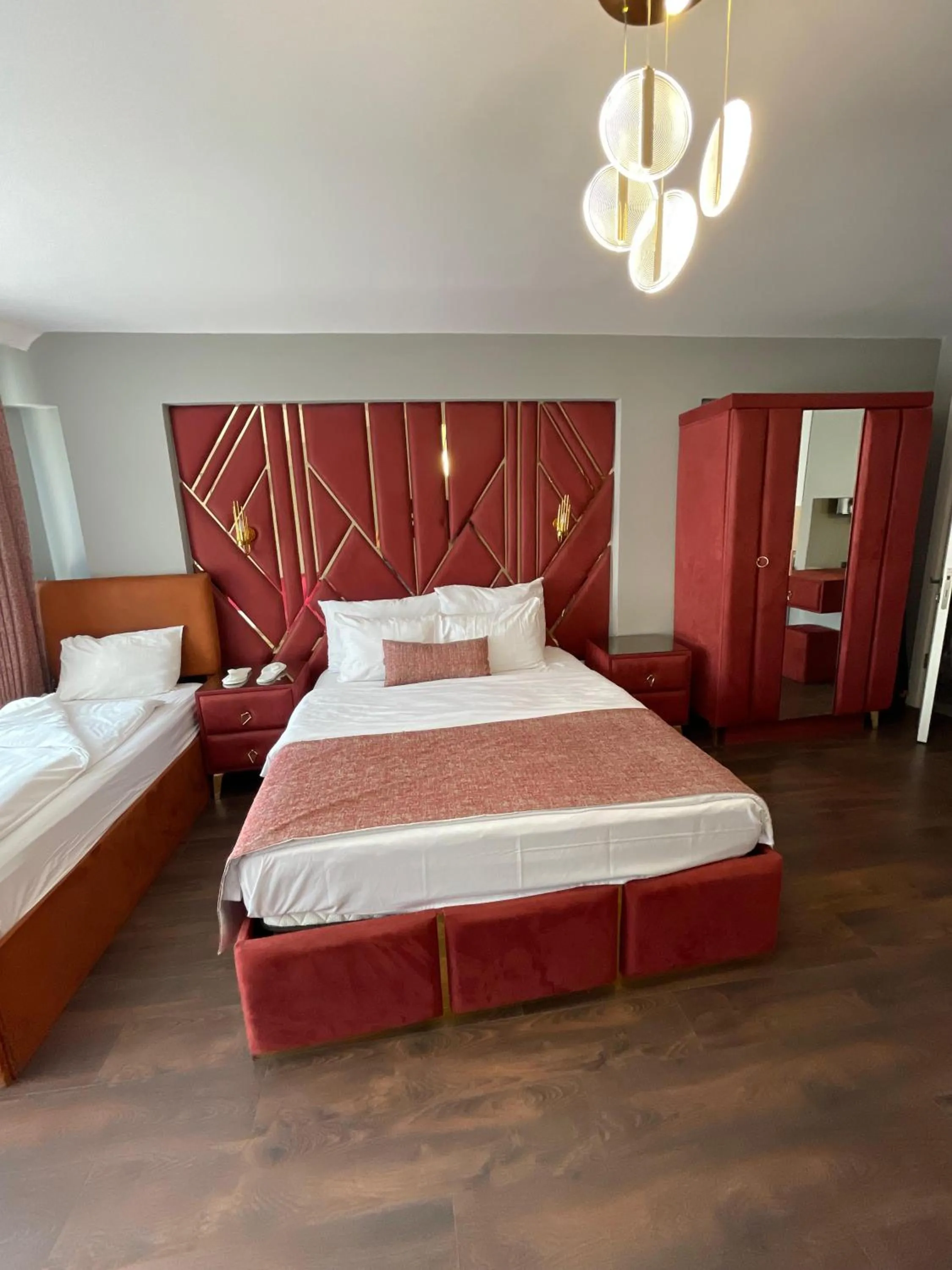 Bed in Aymira Suite Hotel