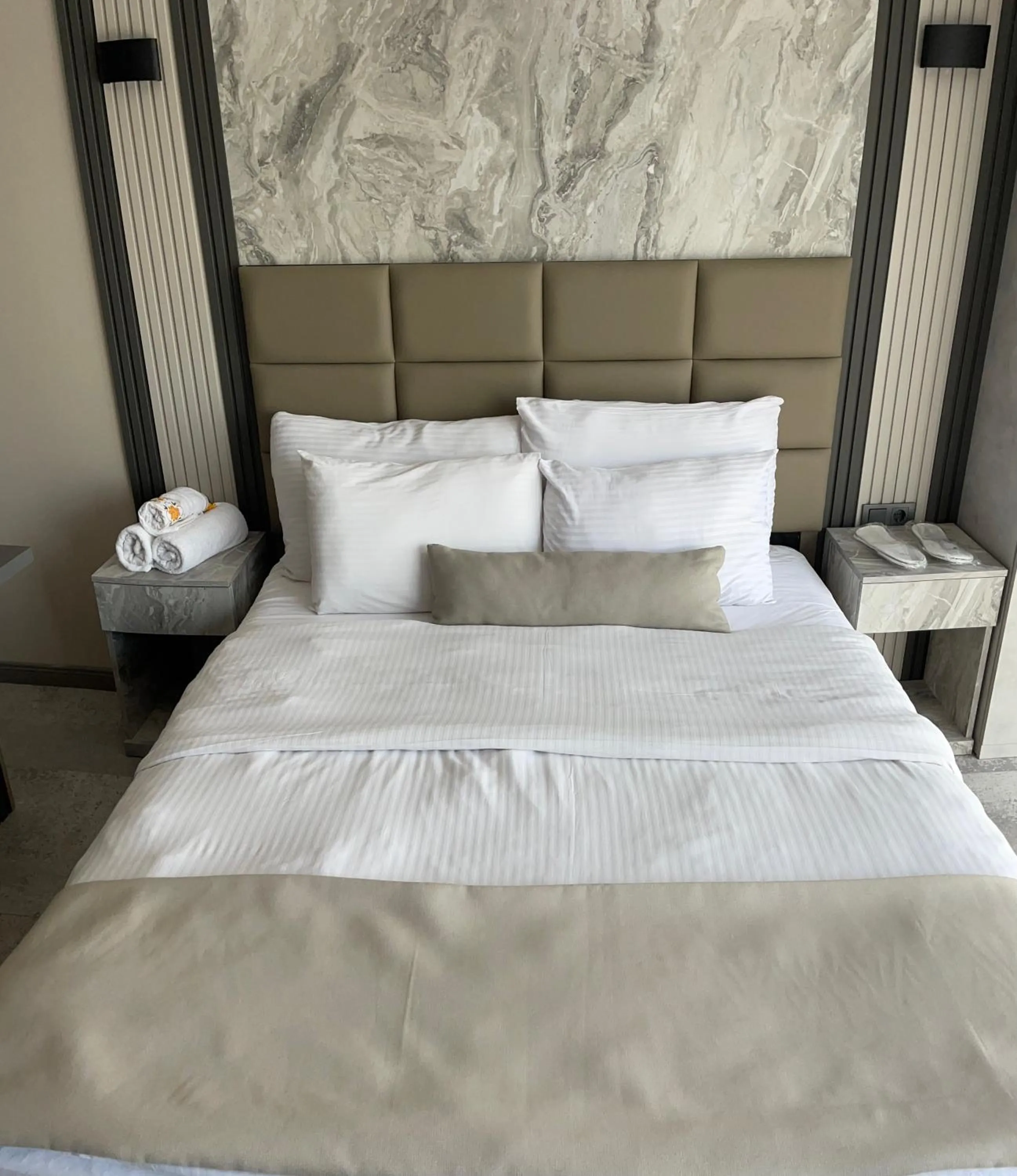 Bed in Aymira Suite Hotel