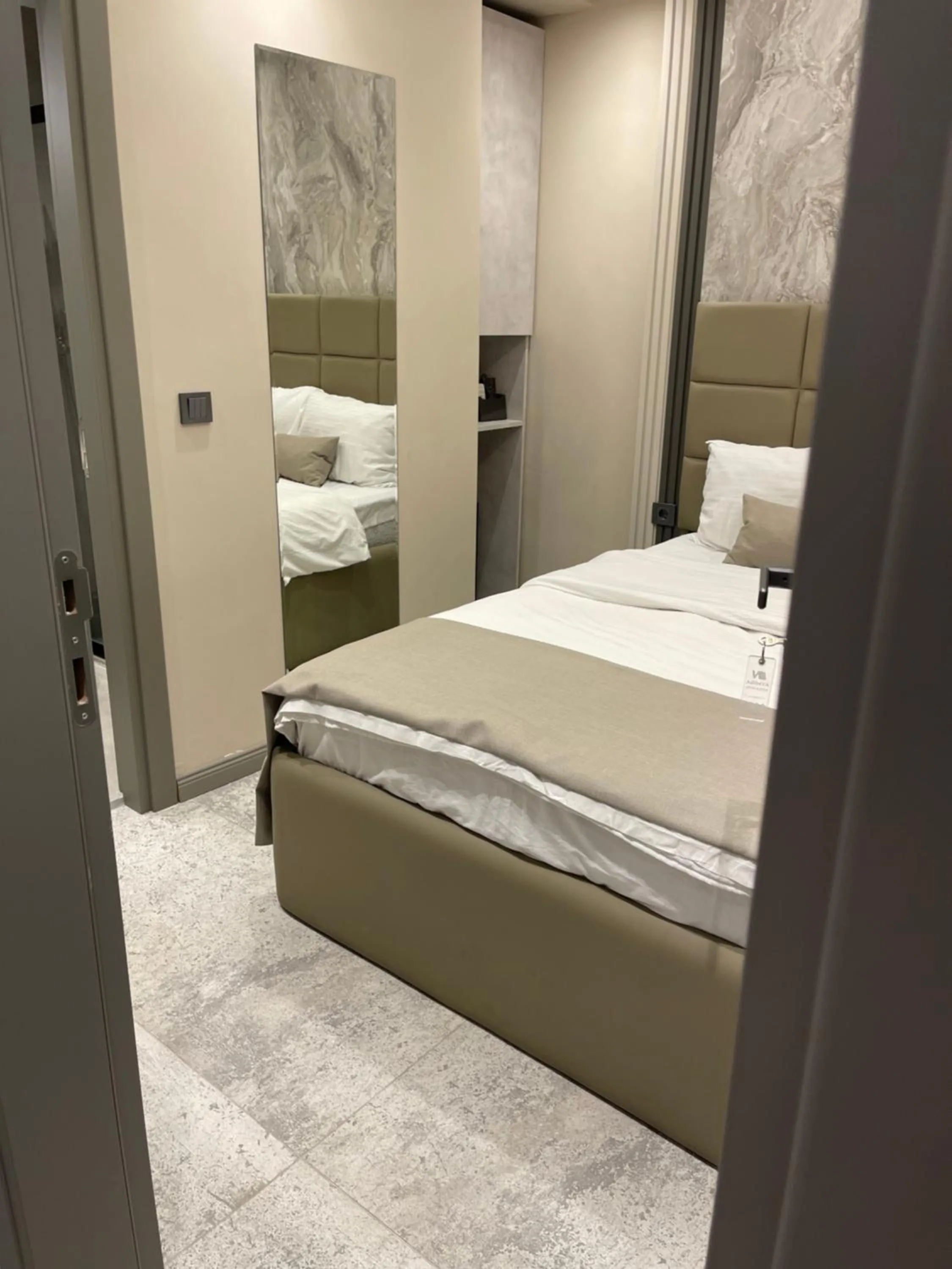 Bed in Aymira Suite Hotel