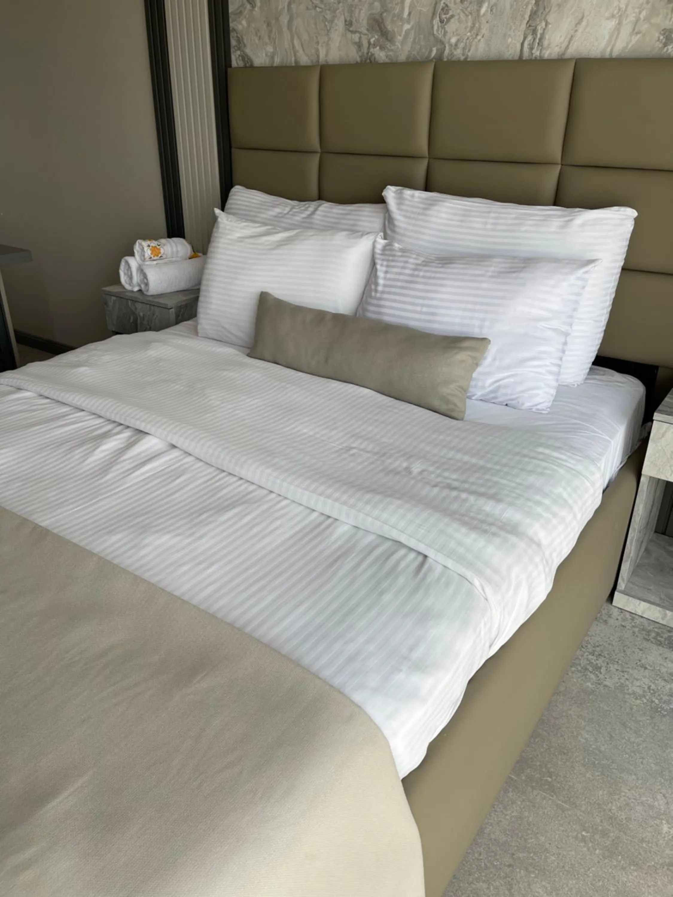 Bed in Aymira Suite Hotel