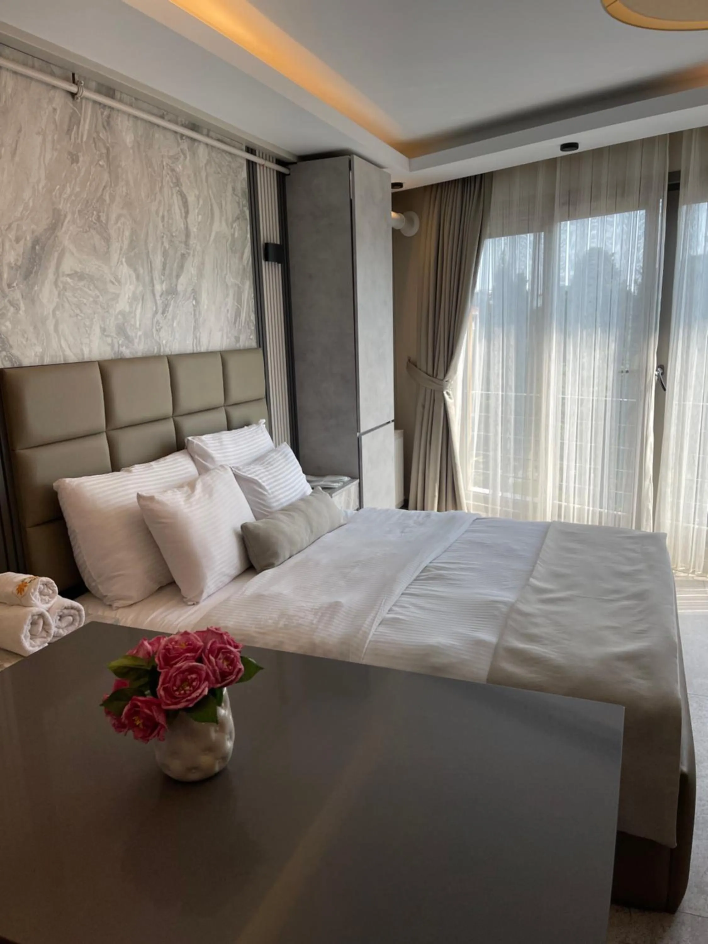 Bed in Aymira Suite Hotel