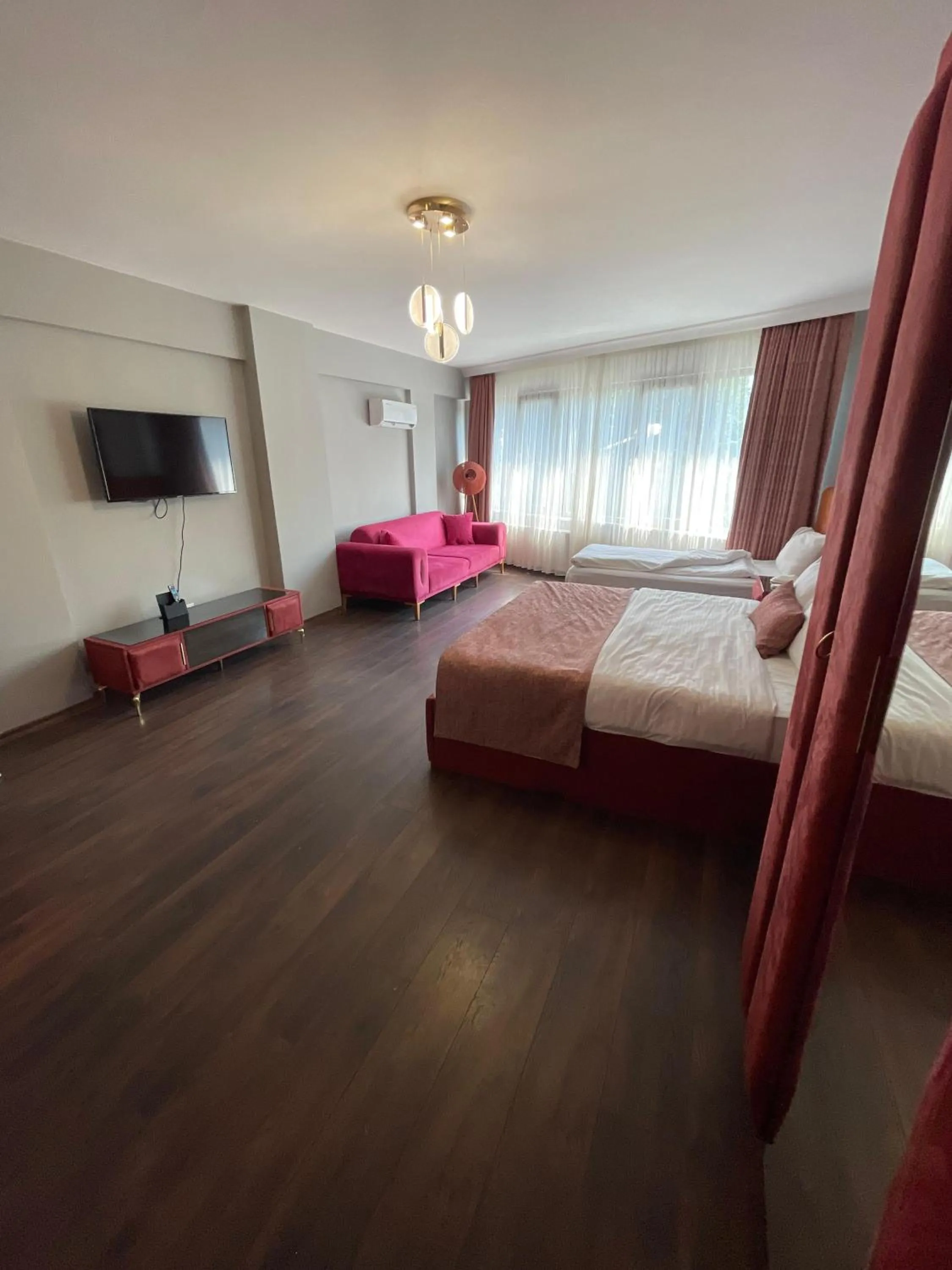 Bed in Aymira Suite Hotel