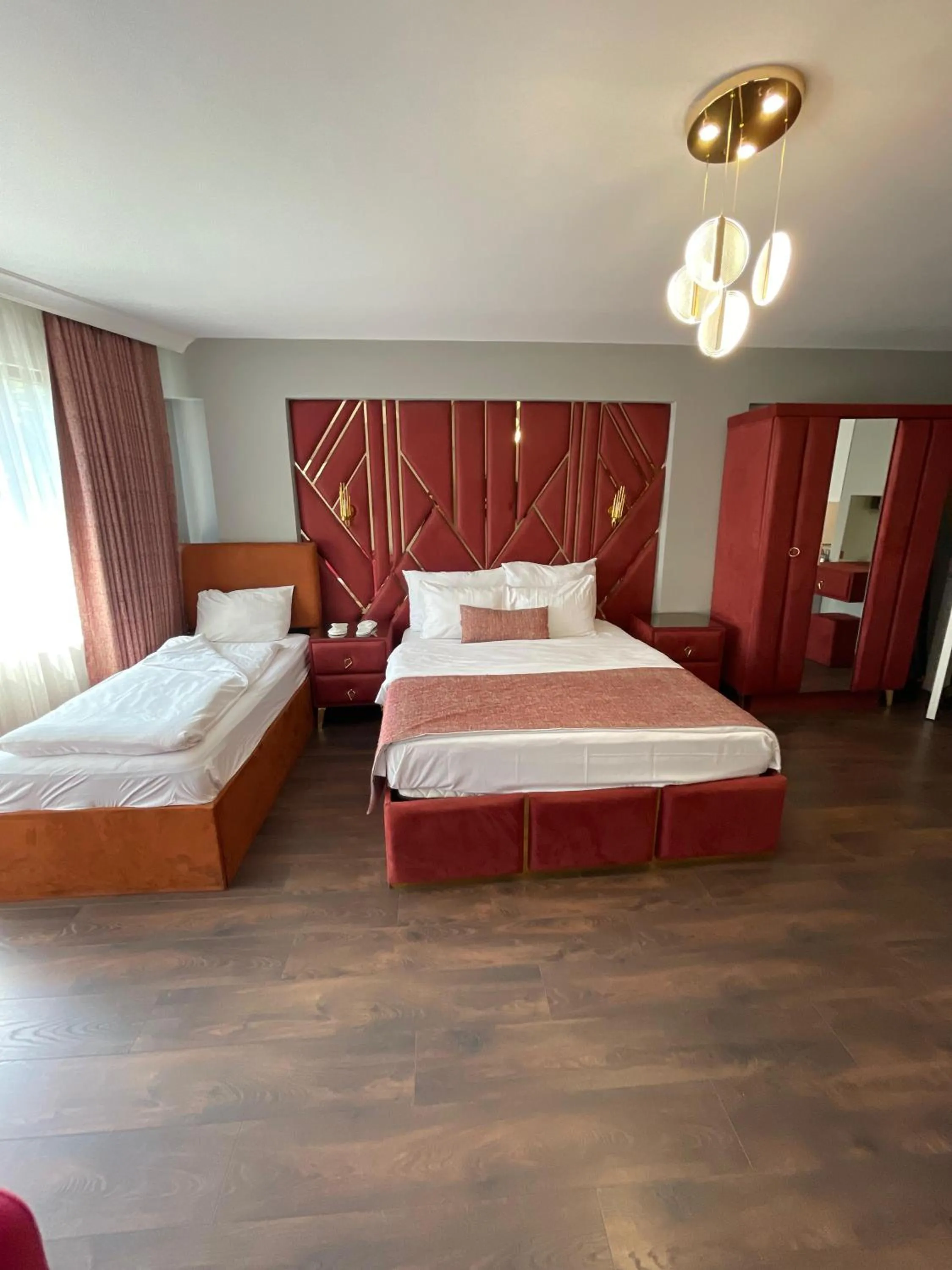 Bed in Aymira Suite Hotel