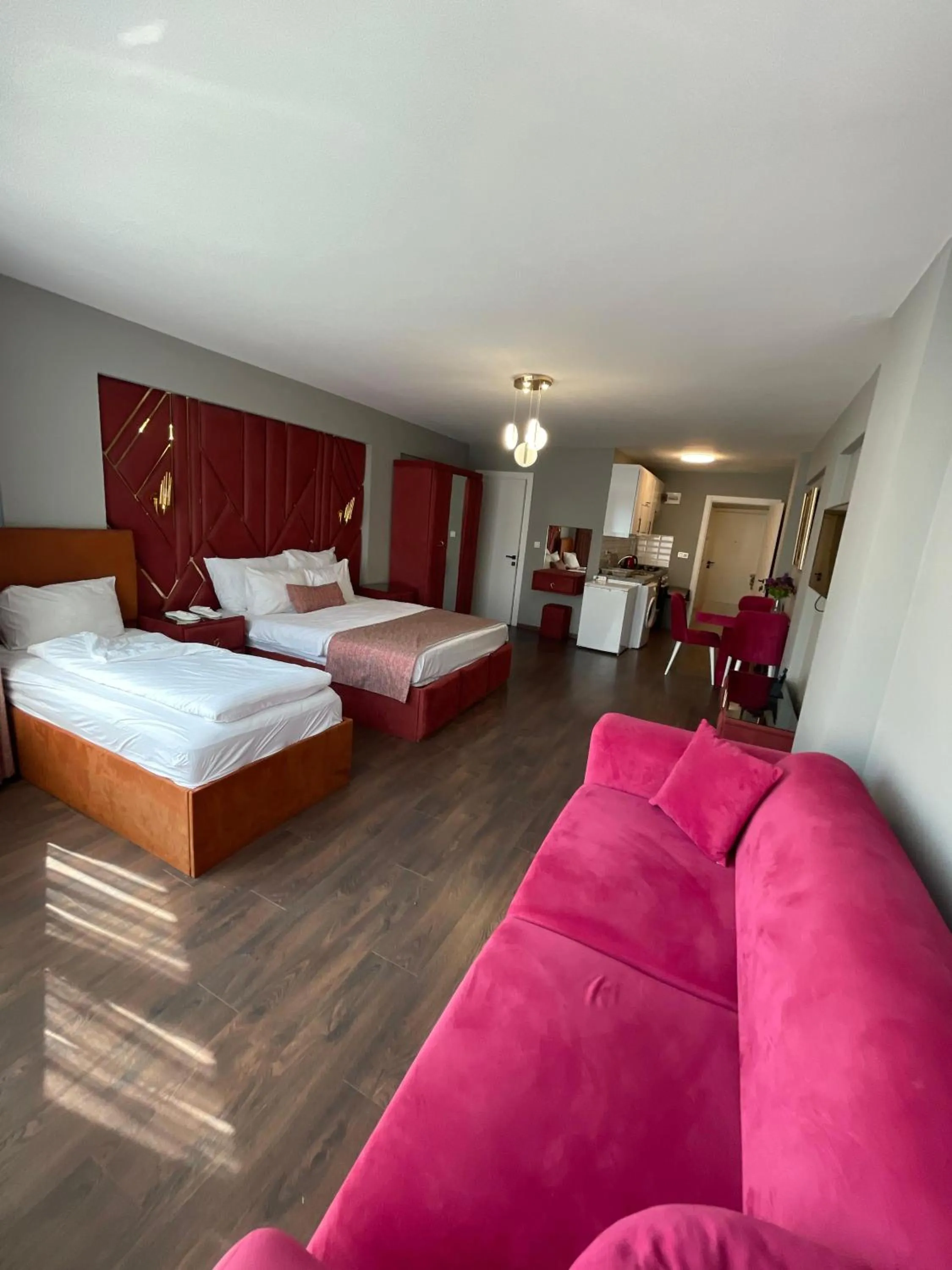 Bed in Aymira Suite Hotel