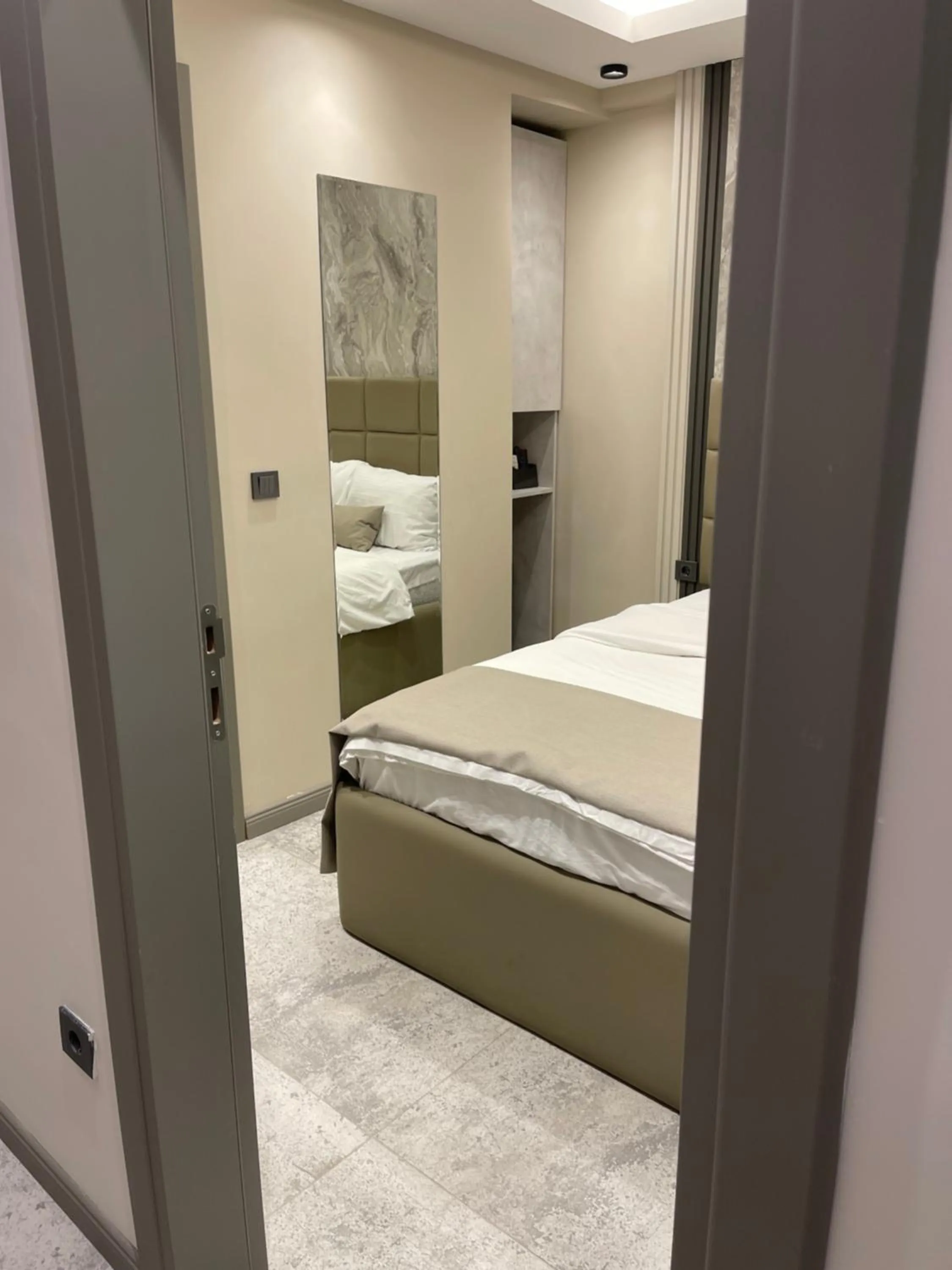 Bed in Aymira Suite Hotel