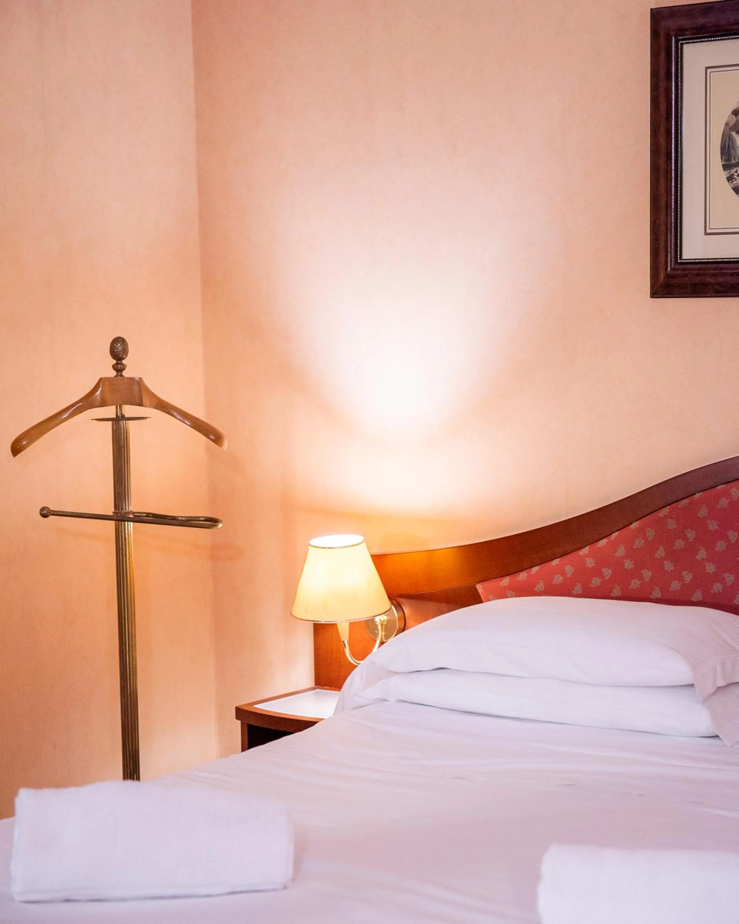 Decorative detail, Bed in Massimo Plaza Hotel