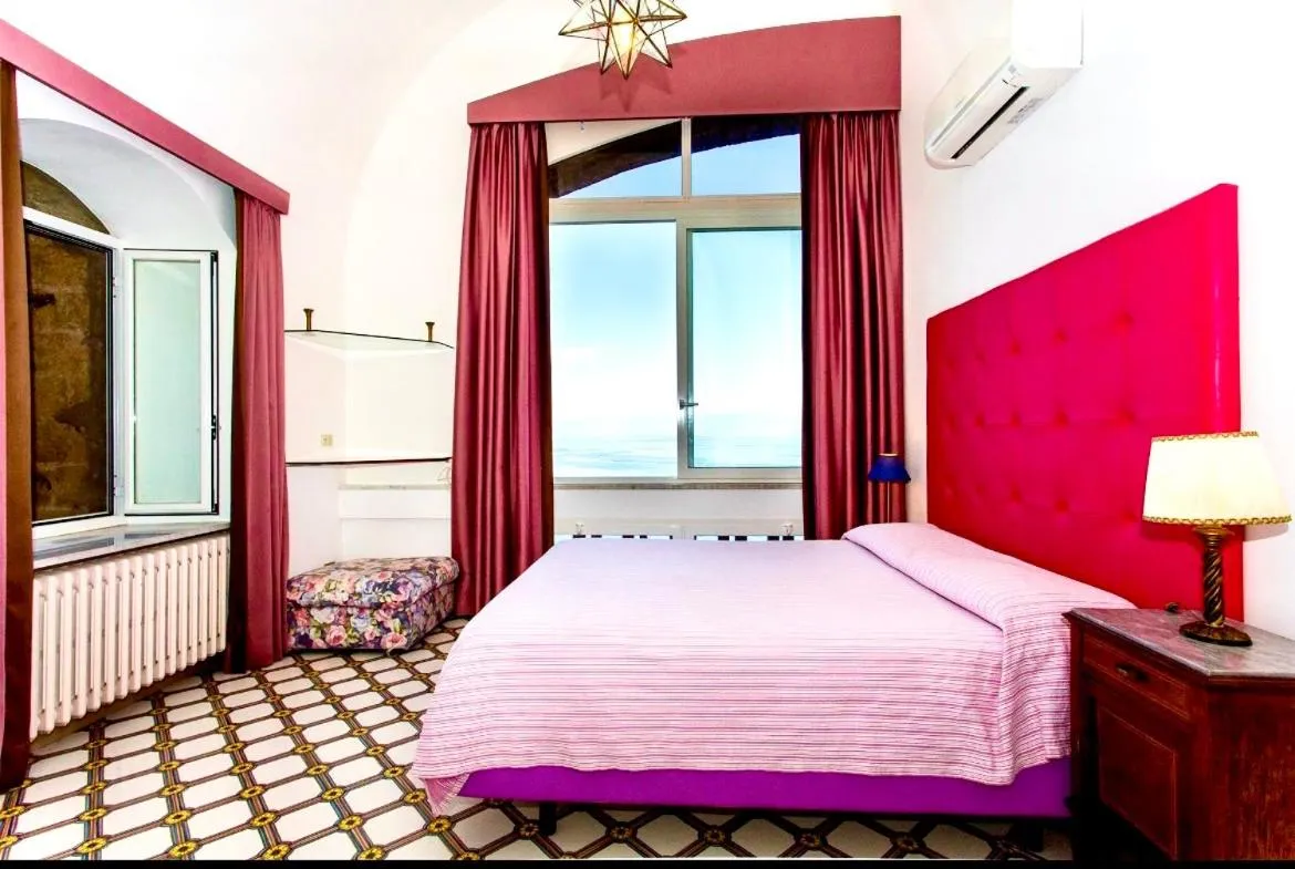 Bed in Villa La Terrazza Suites