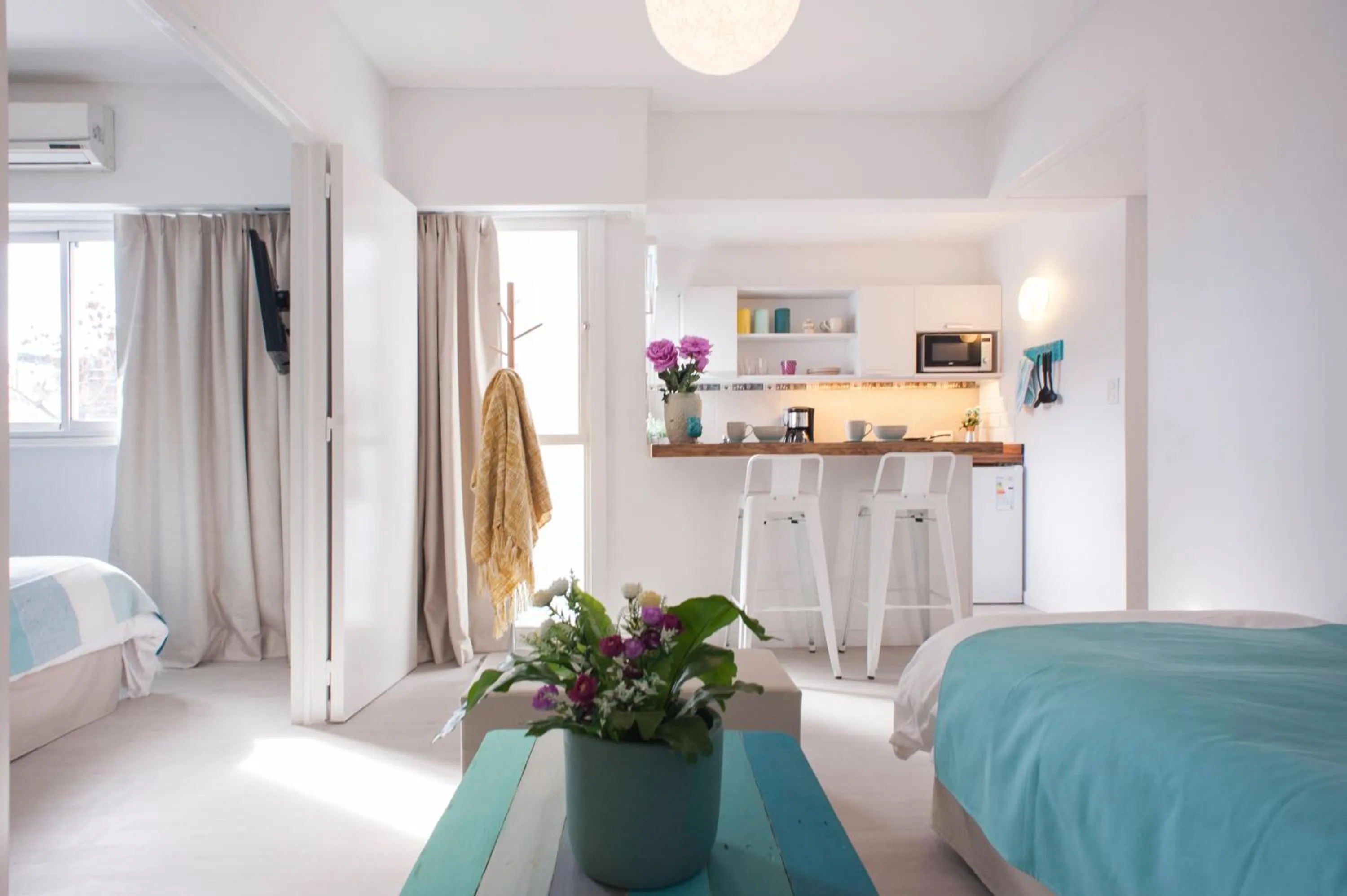 Living room, Bed in Soho Point Central