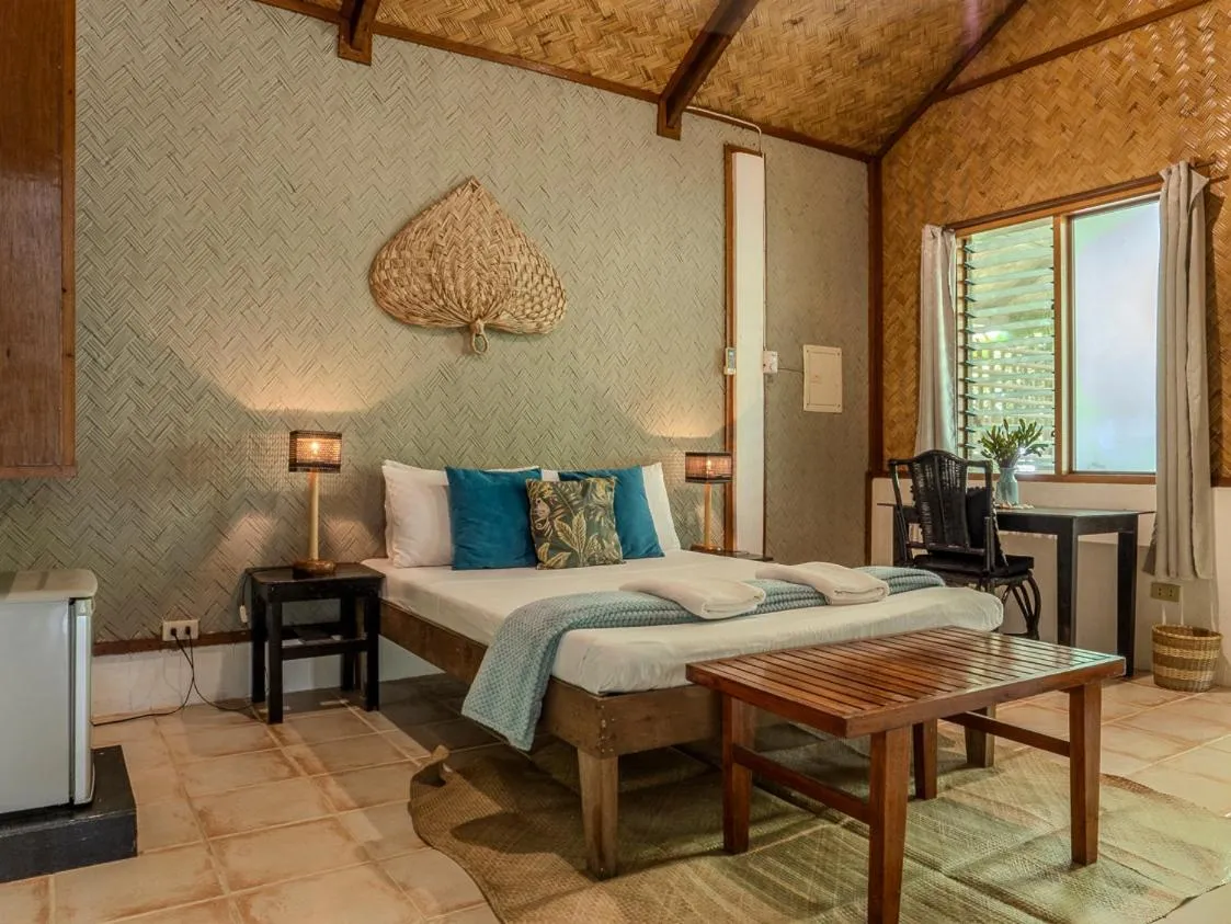 Bed in Golden Monkey Beach Hotel