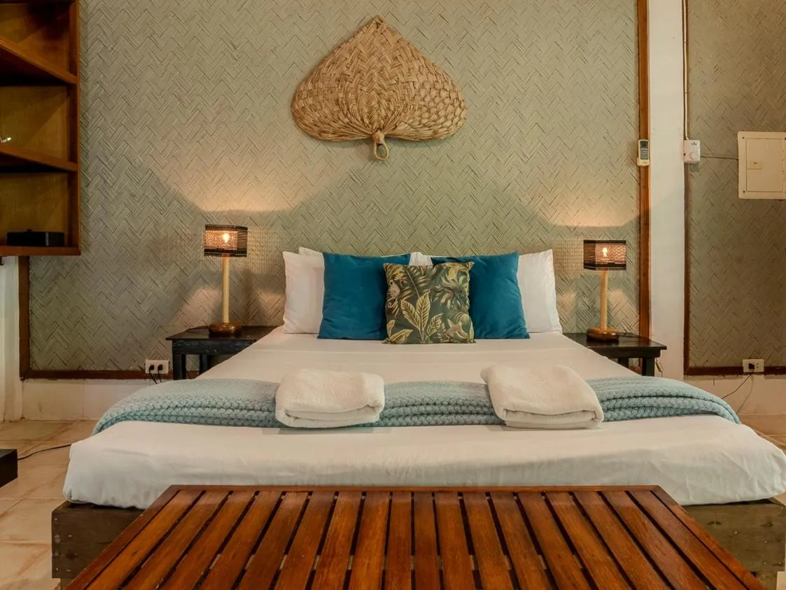 Bed in Golden Monkey Beach Hotel