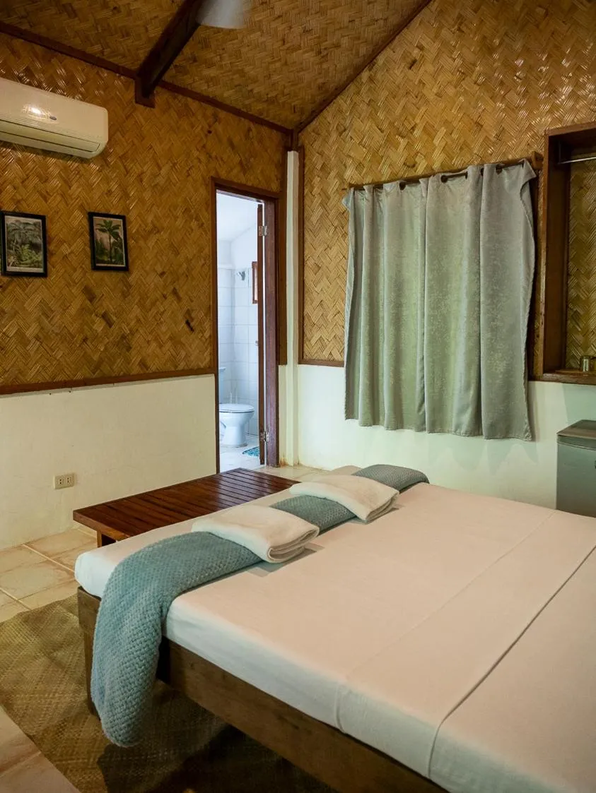 Bed in Golden Monkey Beach Hotel