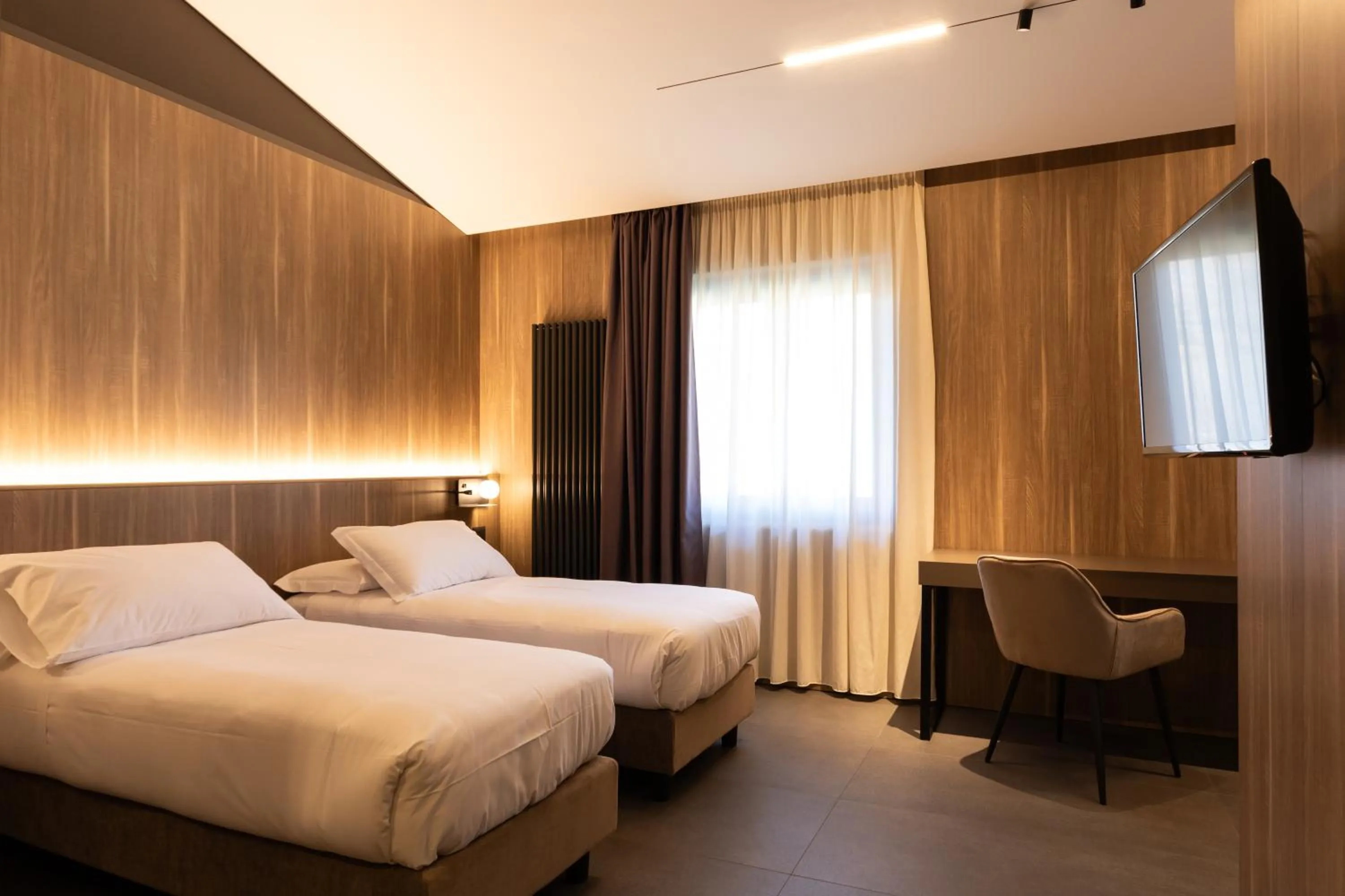 Bed in Sport Village Hotel & Spa