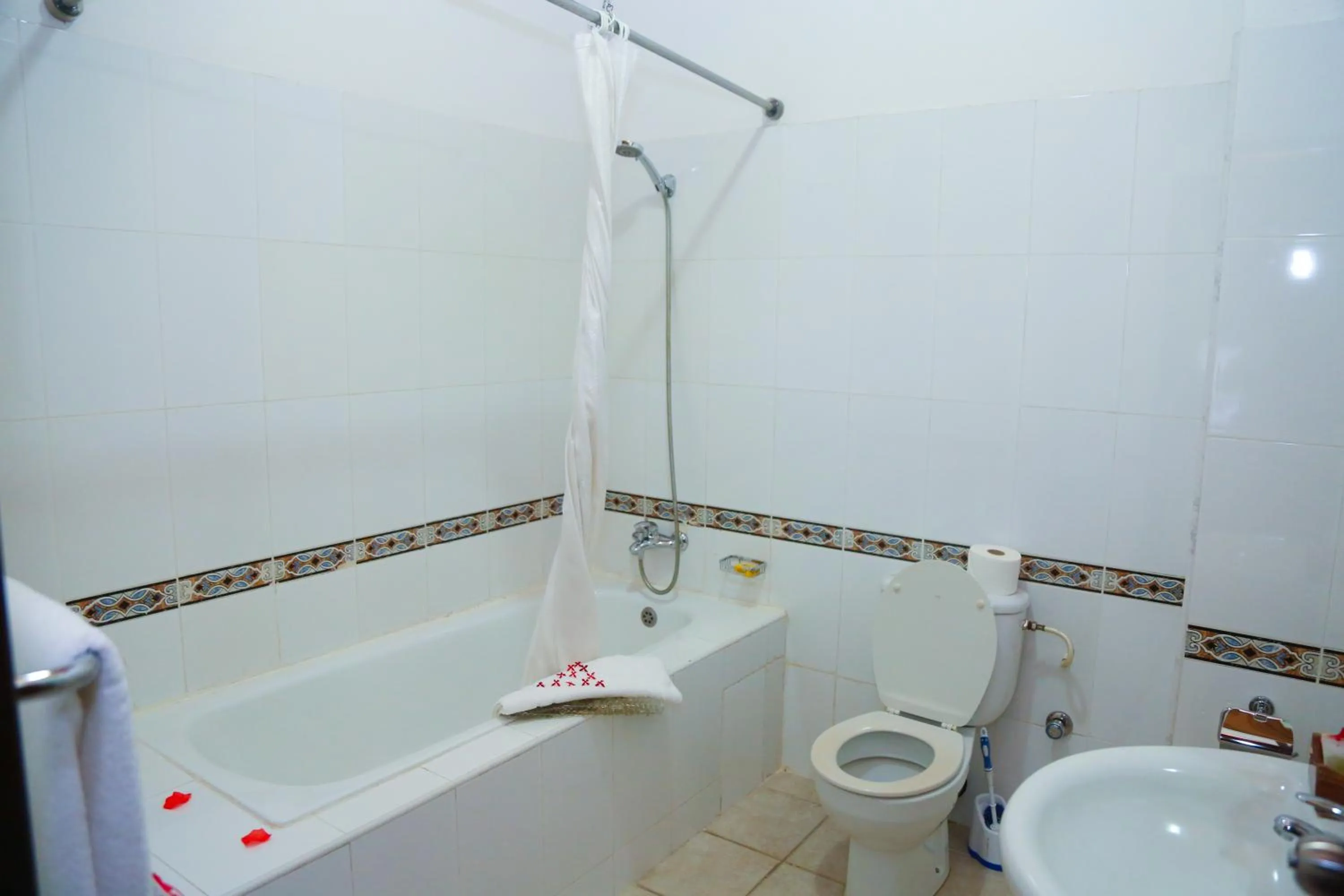 Bathroom in Coconut Grove Regency Hotel