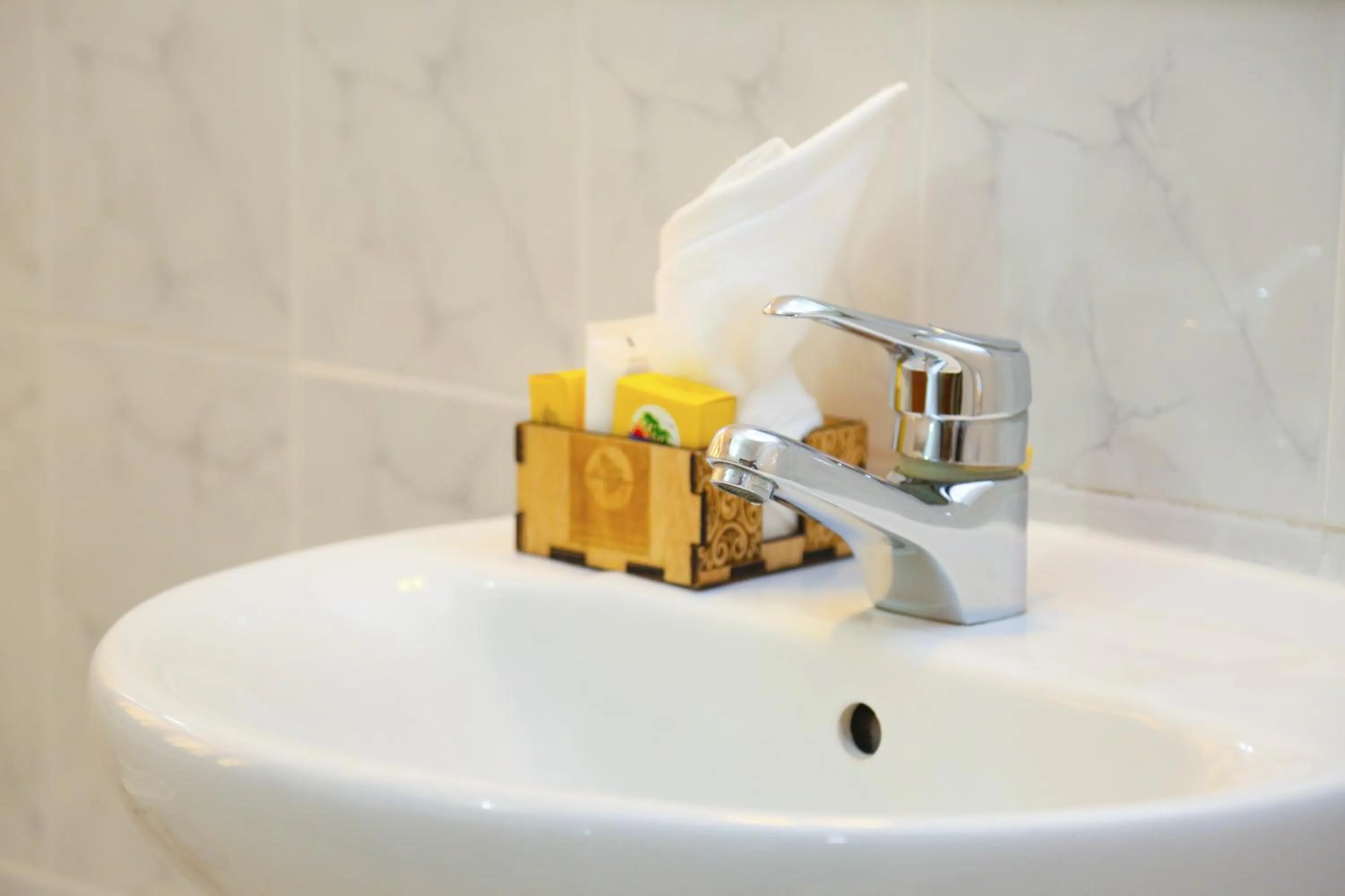 Bathroom in Coconut Grove Regency Hotel