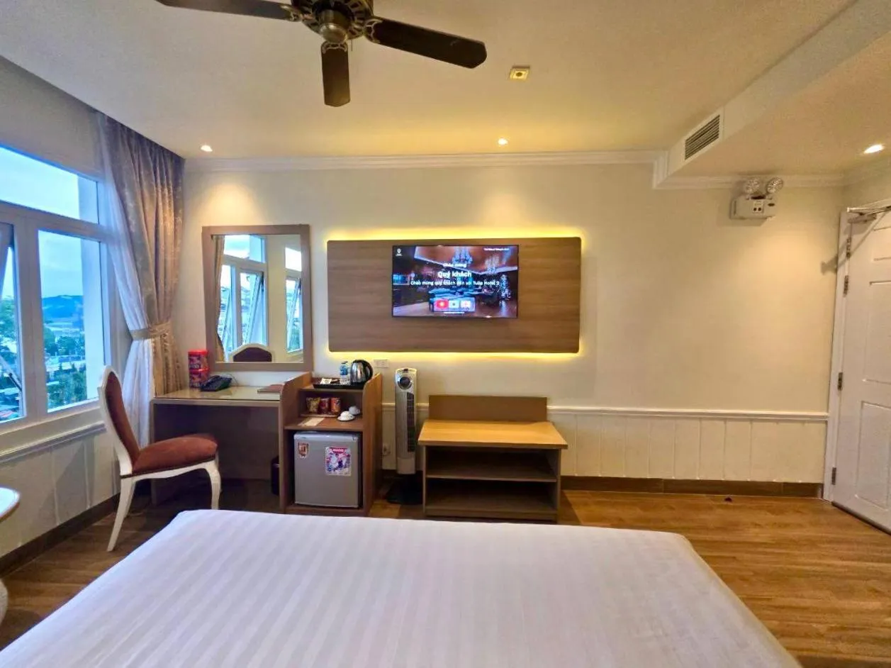 Bed in Tulip Hotel 2