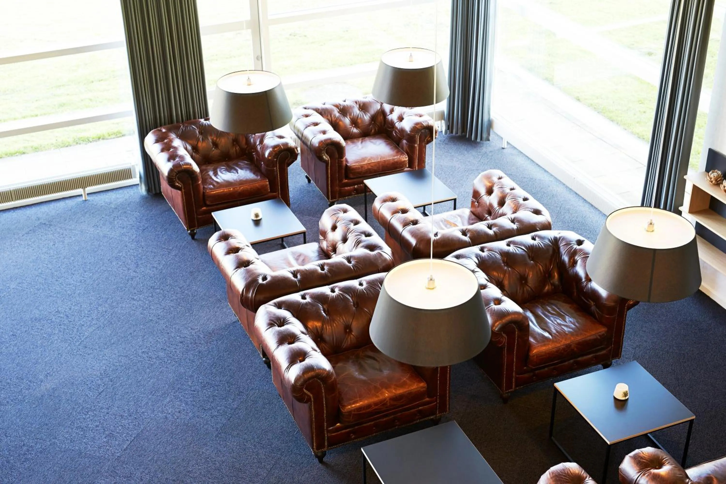 Communal lounge/ TV room in HORISONT Hotel & Konference