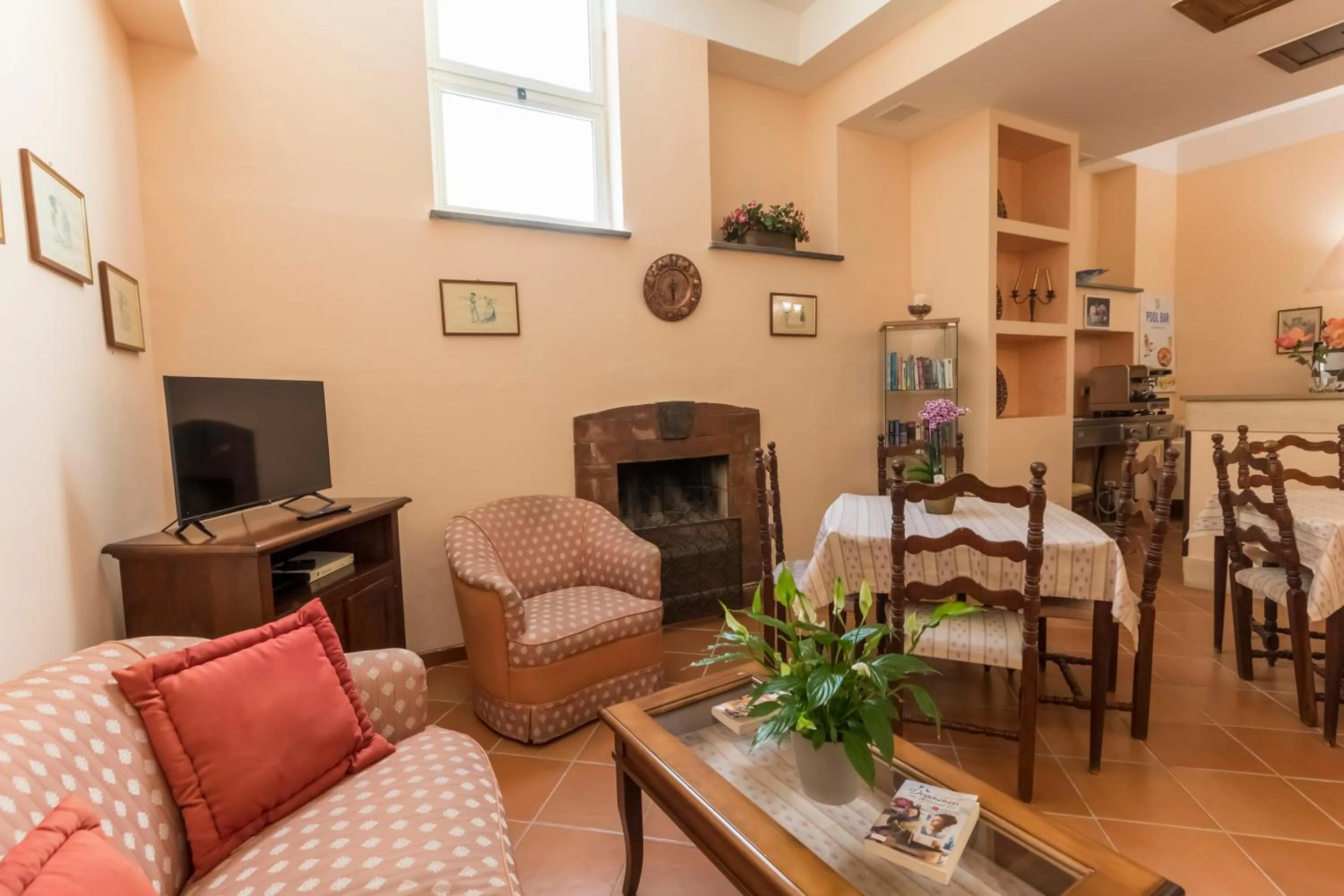 Communal lounge/ TV room in Villa Romita