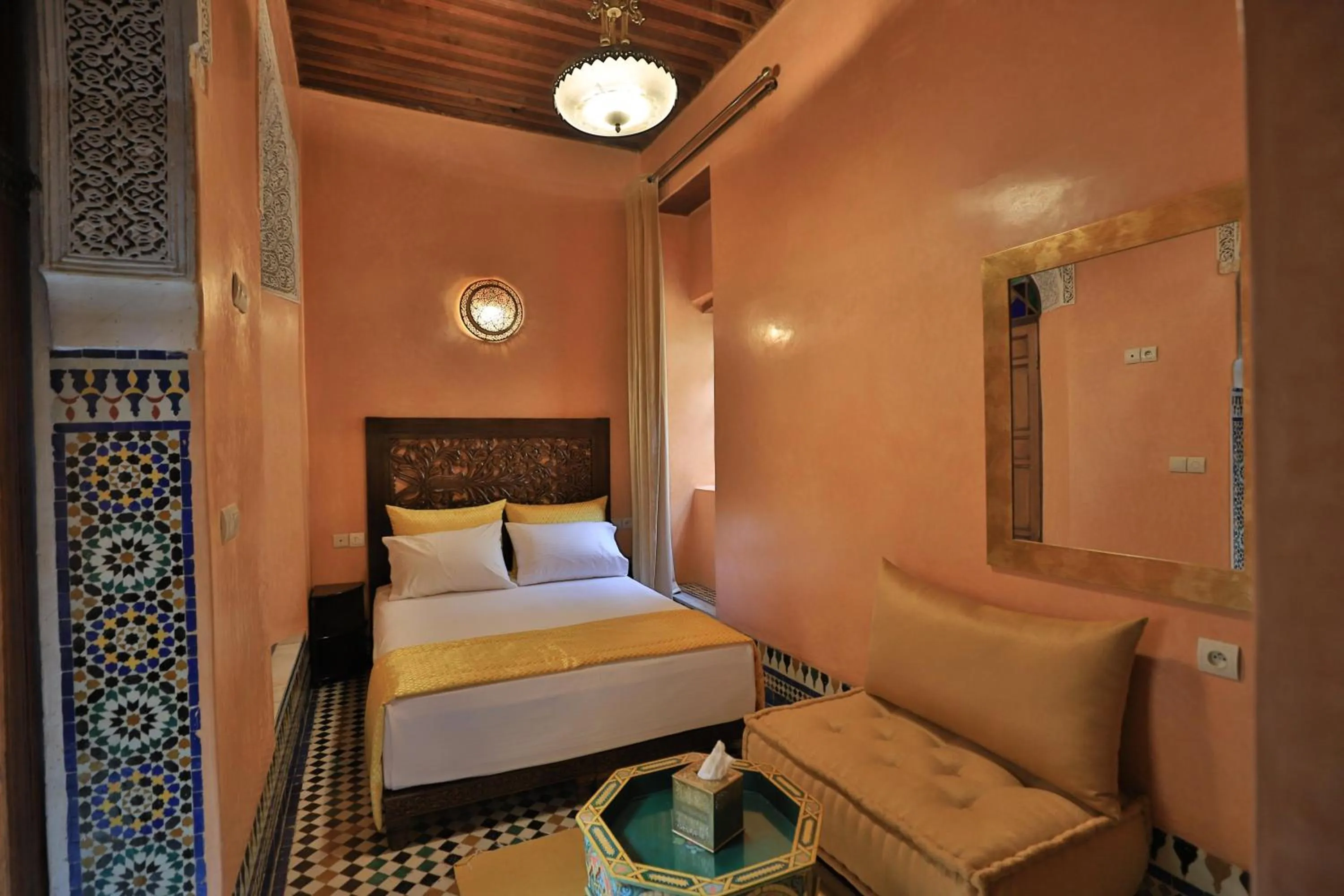 Bed in Riad Moulaydriss et Giacomo