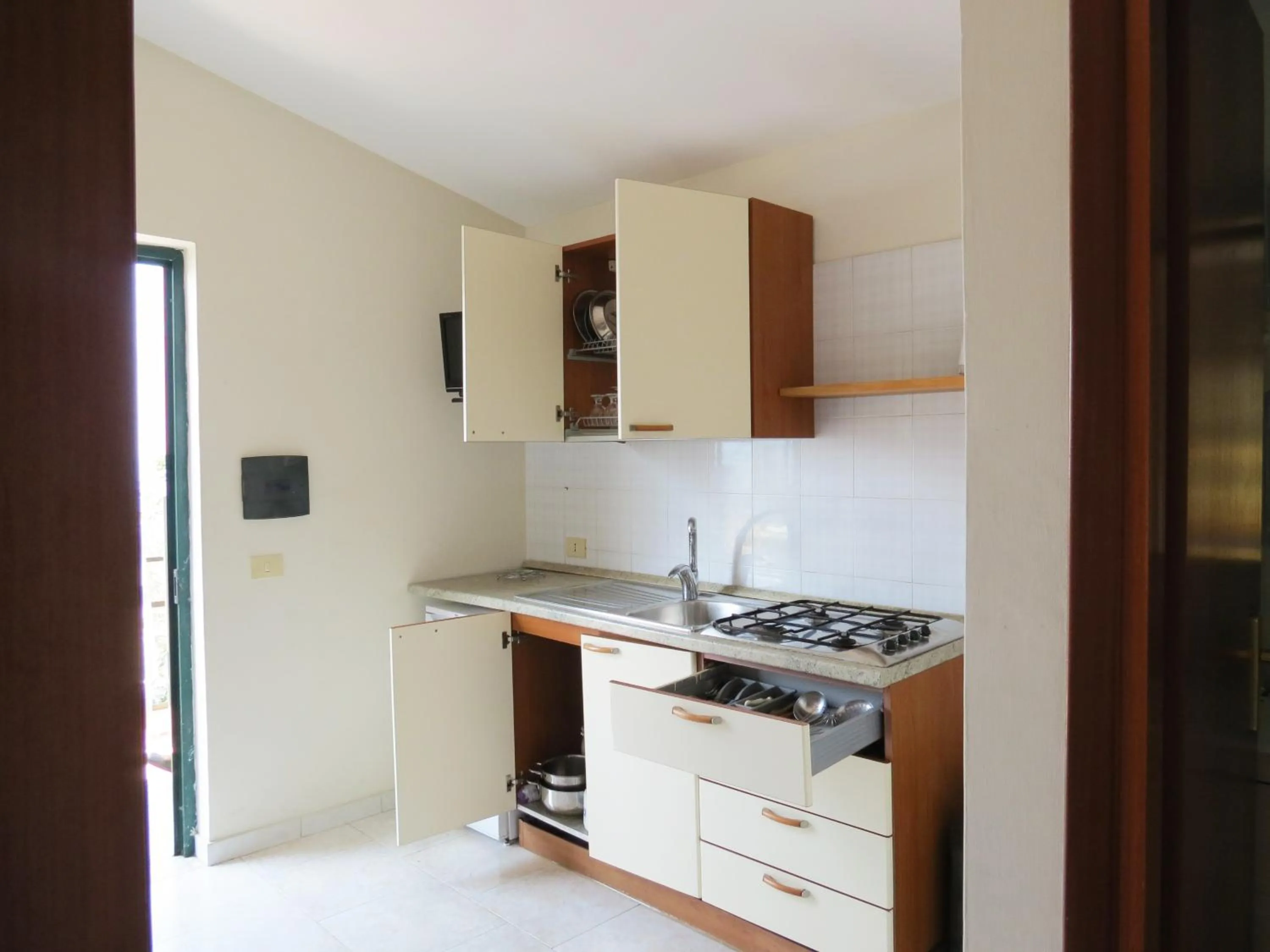 Kitchen or kitchenette in Baia Serena