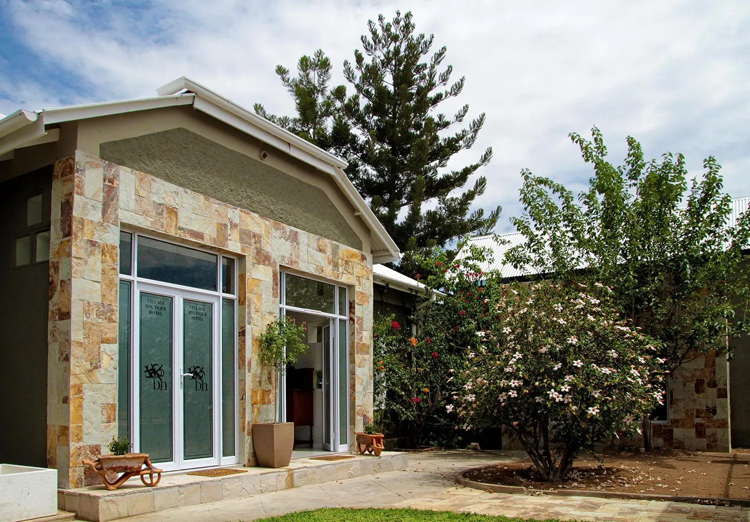Facade/entrance in Village Boutique Hotel