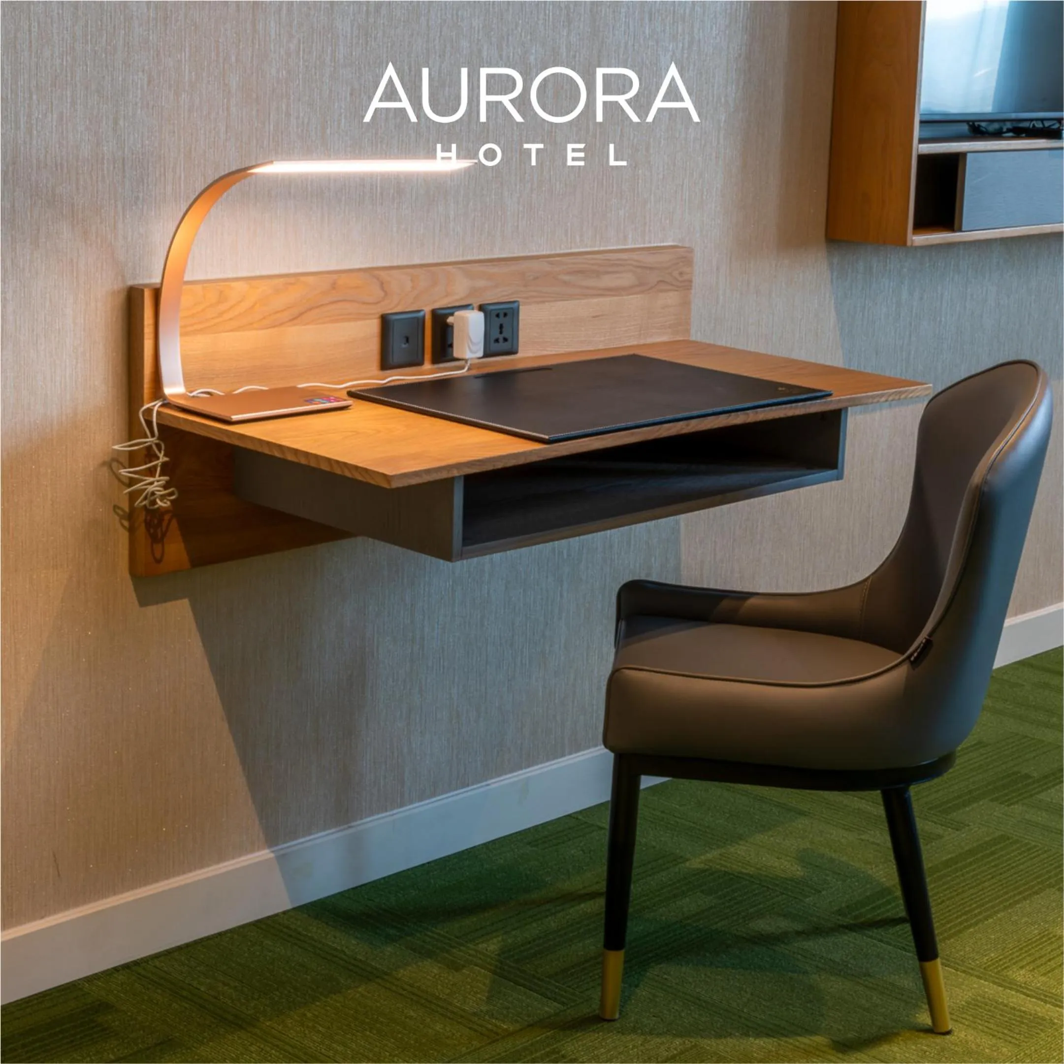 Property logo or sign in Aurora Hotel