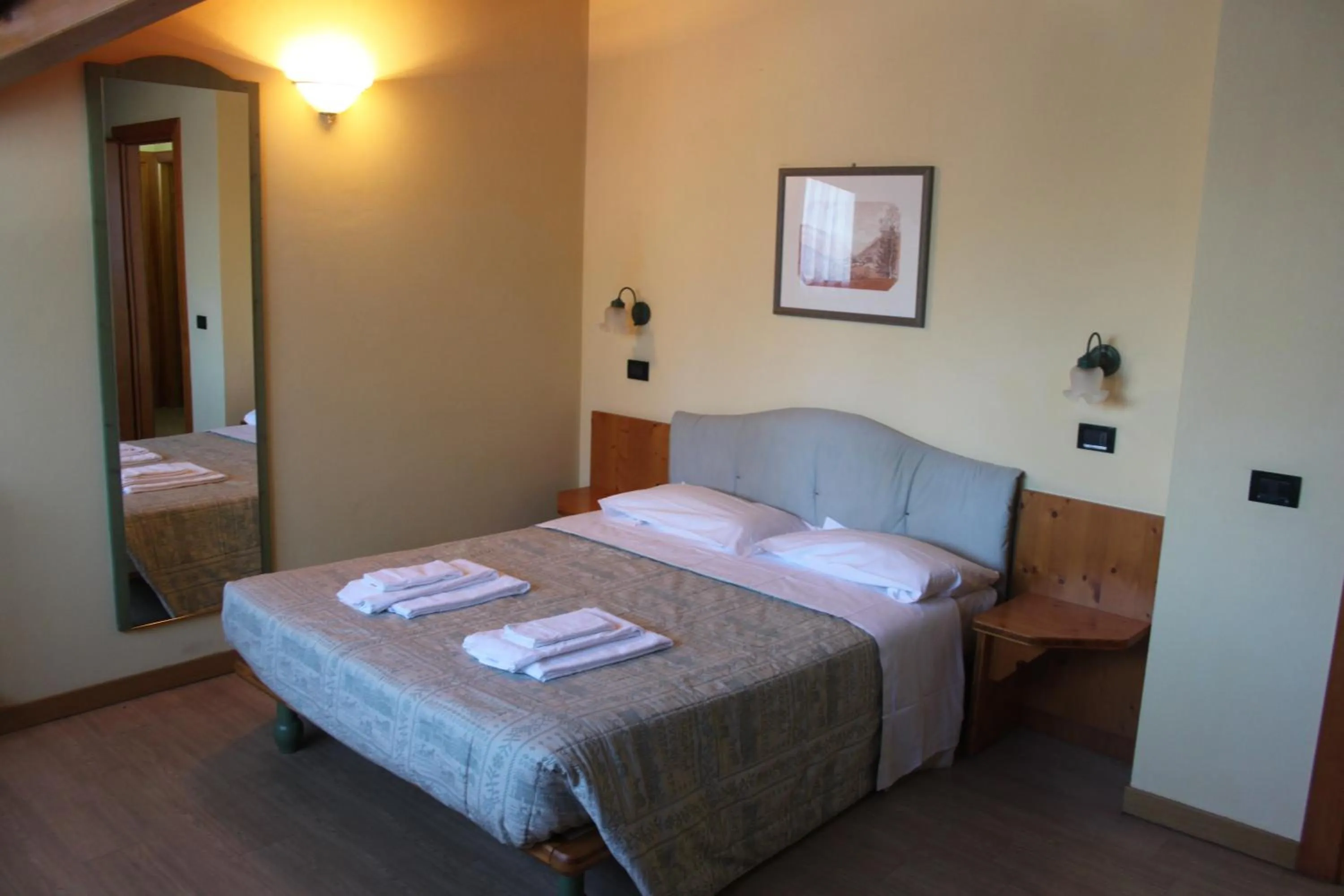 Bedroom, Bed in Nevesole Folgarida Resort Aparthotel