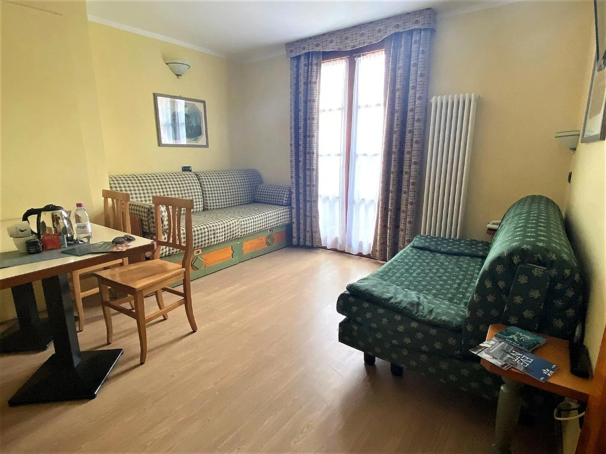 Living room, Bed in Nevesole Folgarida Resort Aparthotel