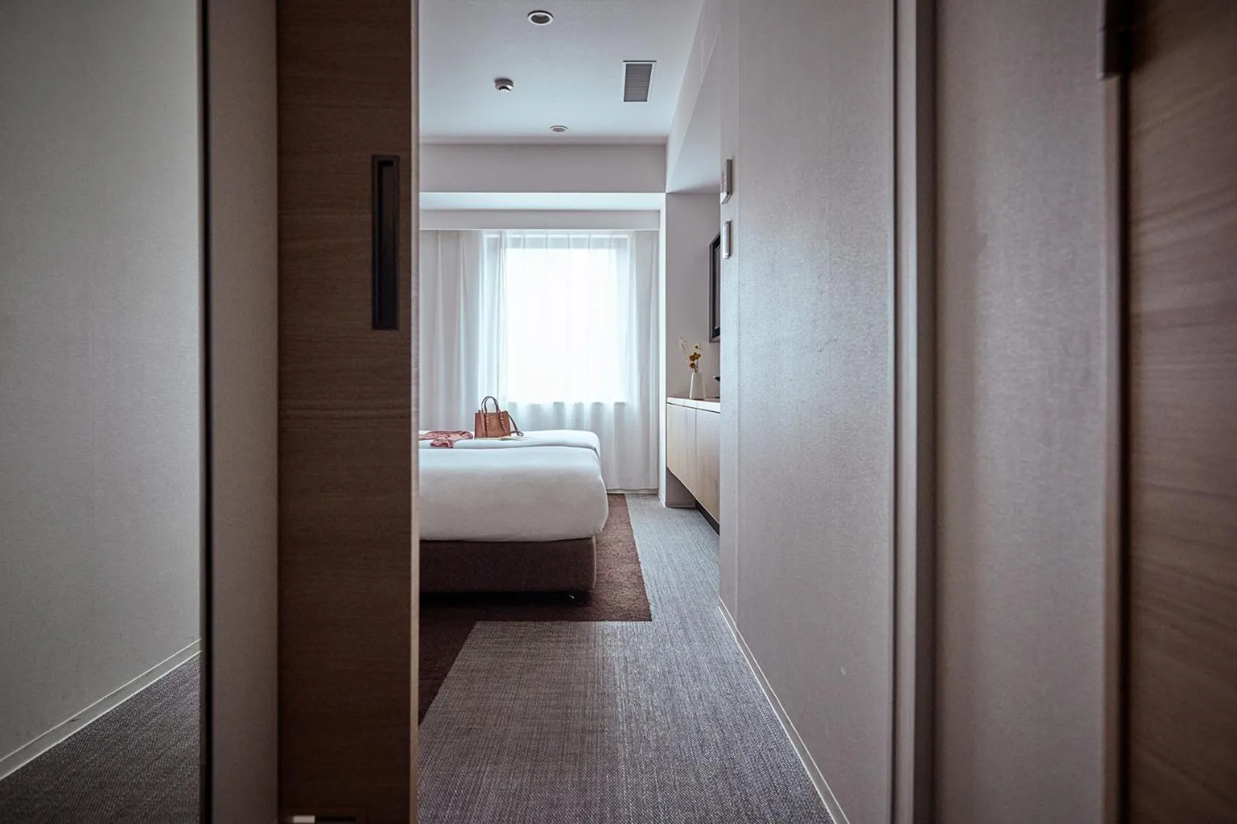 Photo of the whole room, Bed in OMO3 Tokyo Akasaka by Hoshino Resort