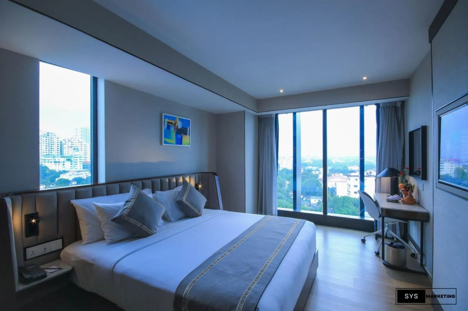 Bed in Sayarsan Hotel Yangon