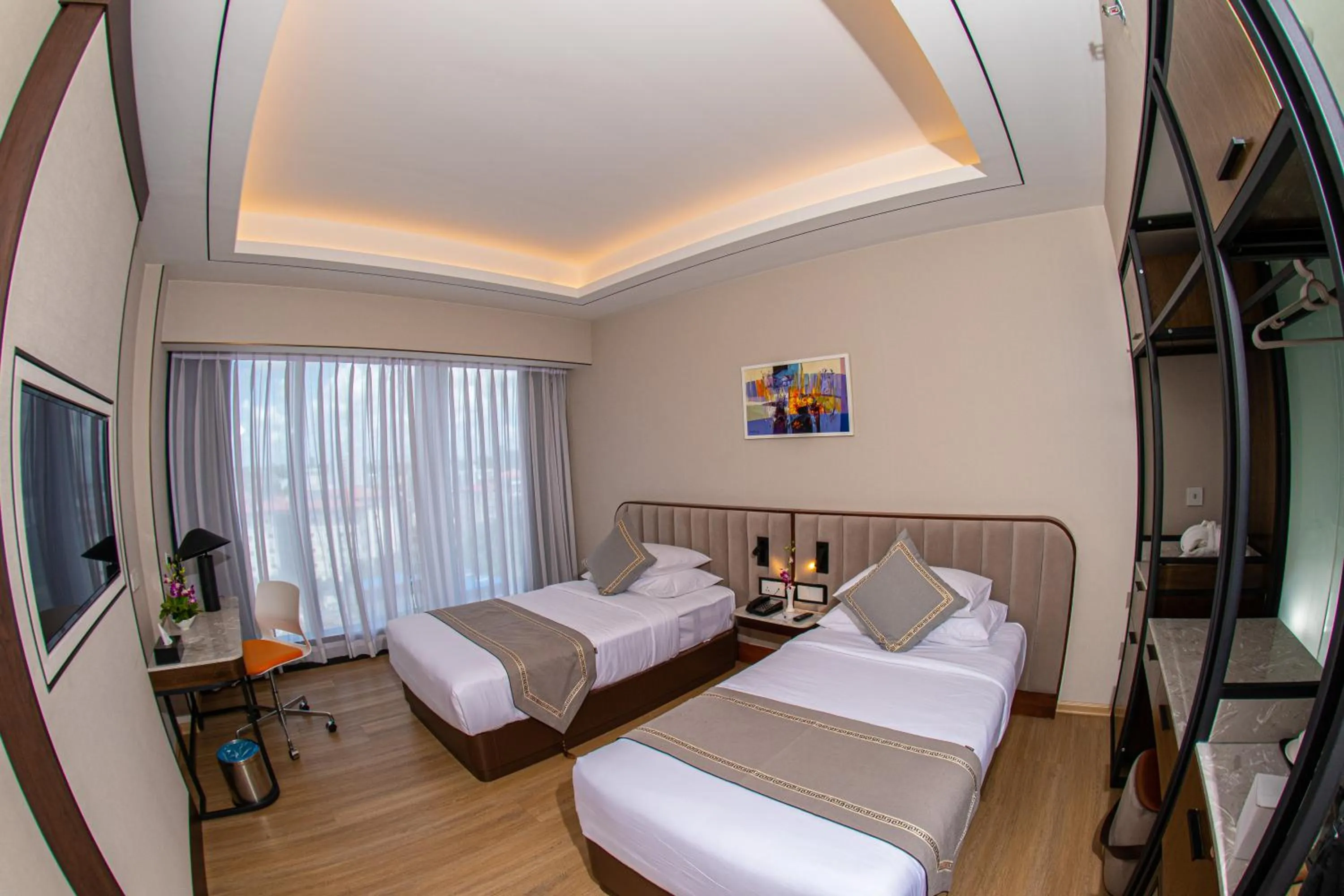 Bed in Sayarsan Hotel Yangon