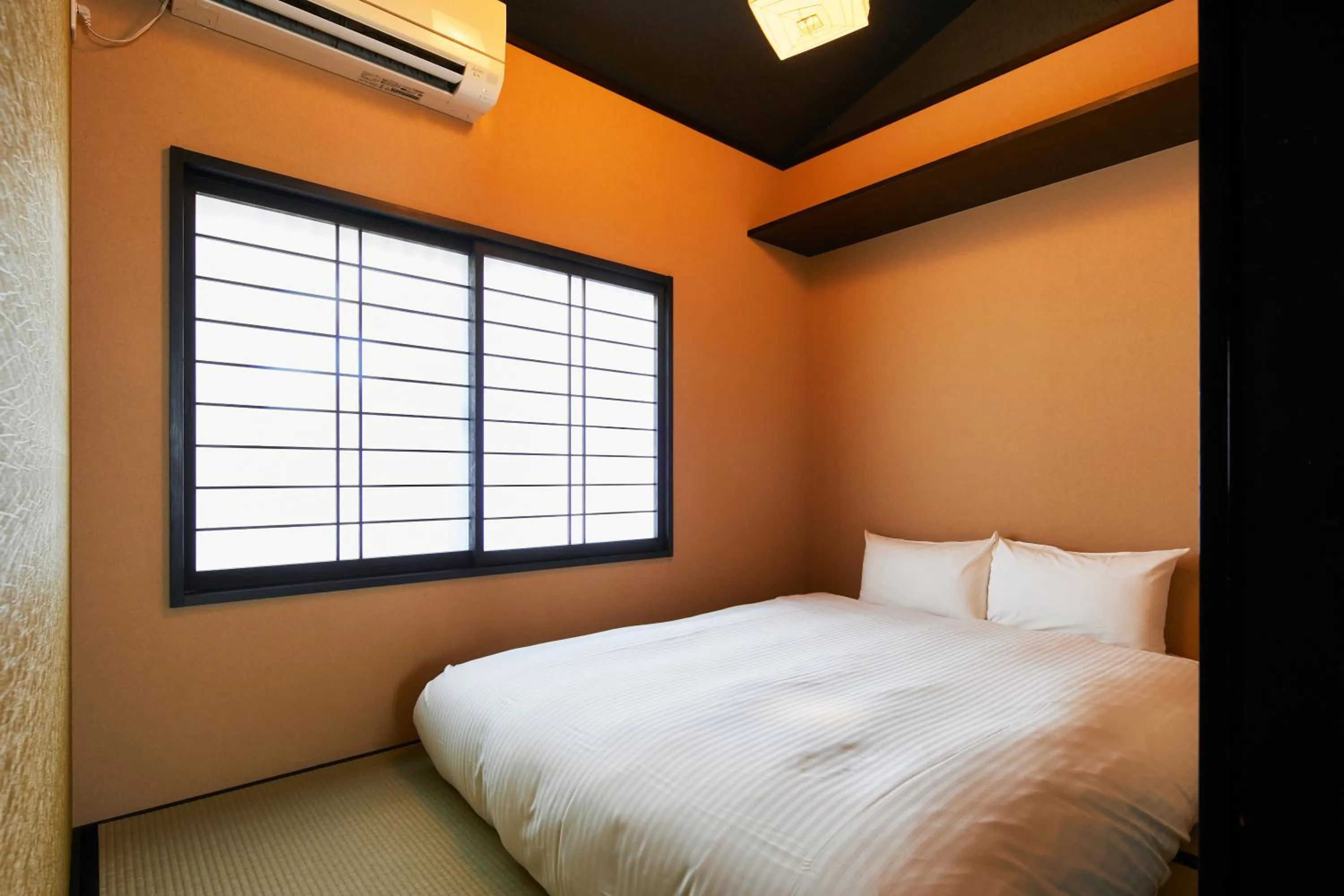 Bedroom, Bed in TSUBOMI luxury Inn Shimabara Bettei 3