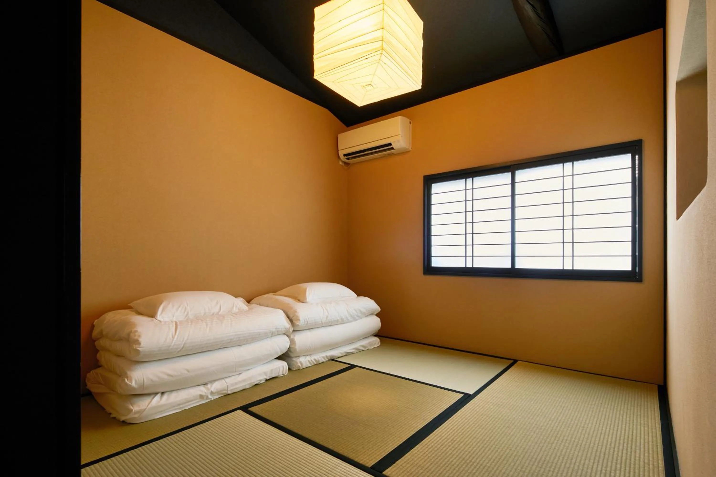 Bedroom, Bed in TSUBOMI luxury Inn Shimabara Bettei 3