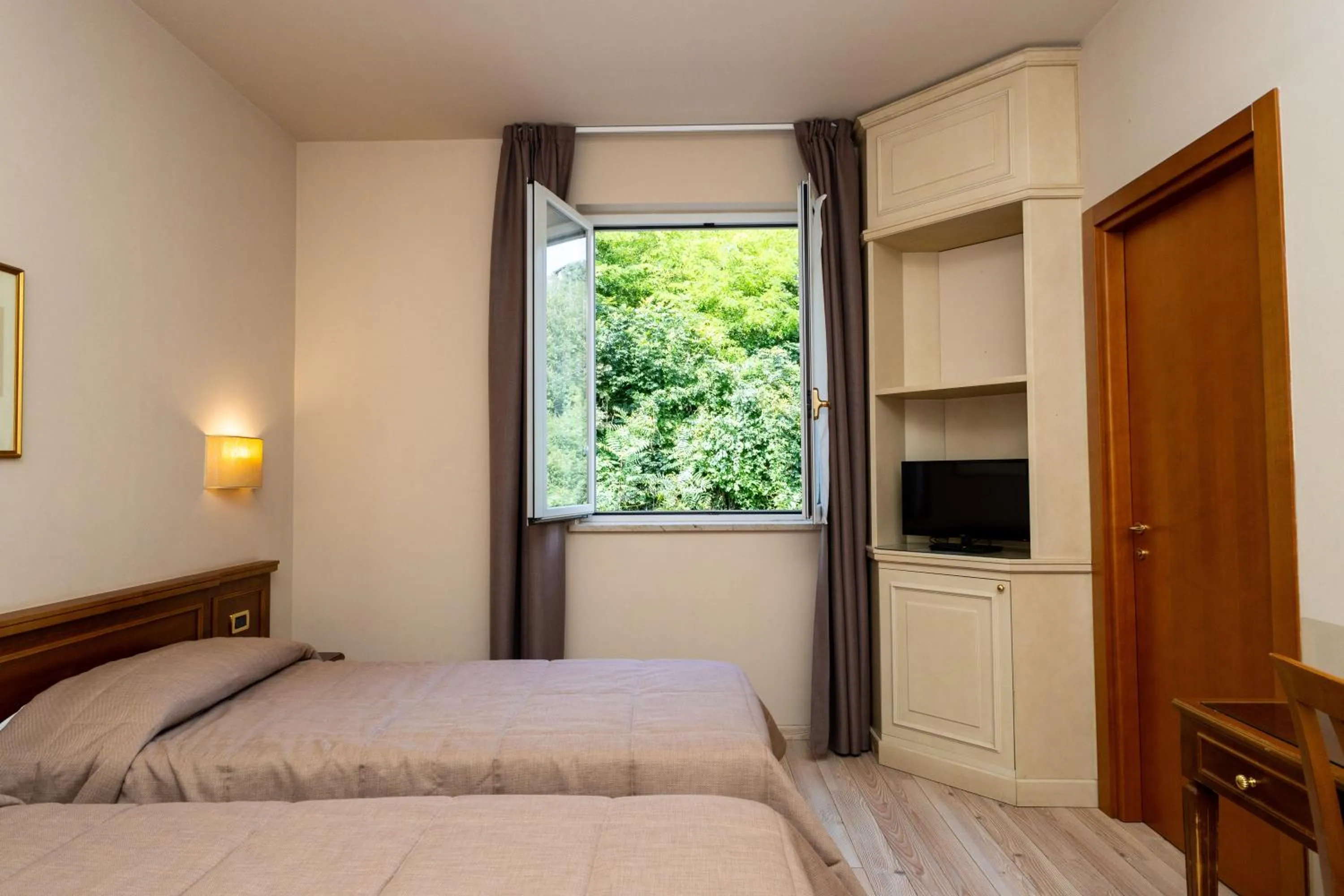 Bed in Hotel Valentino