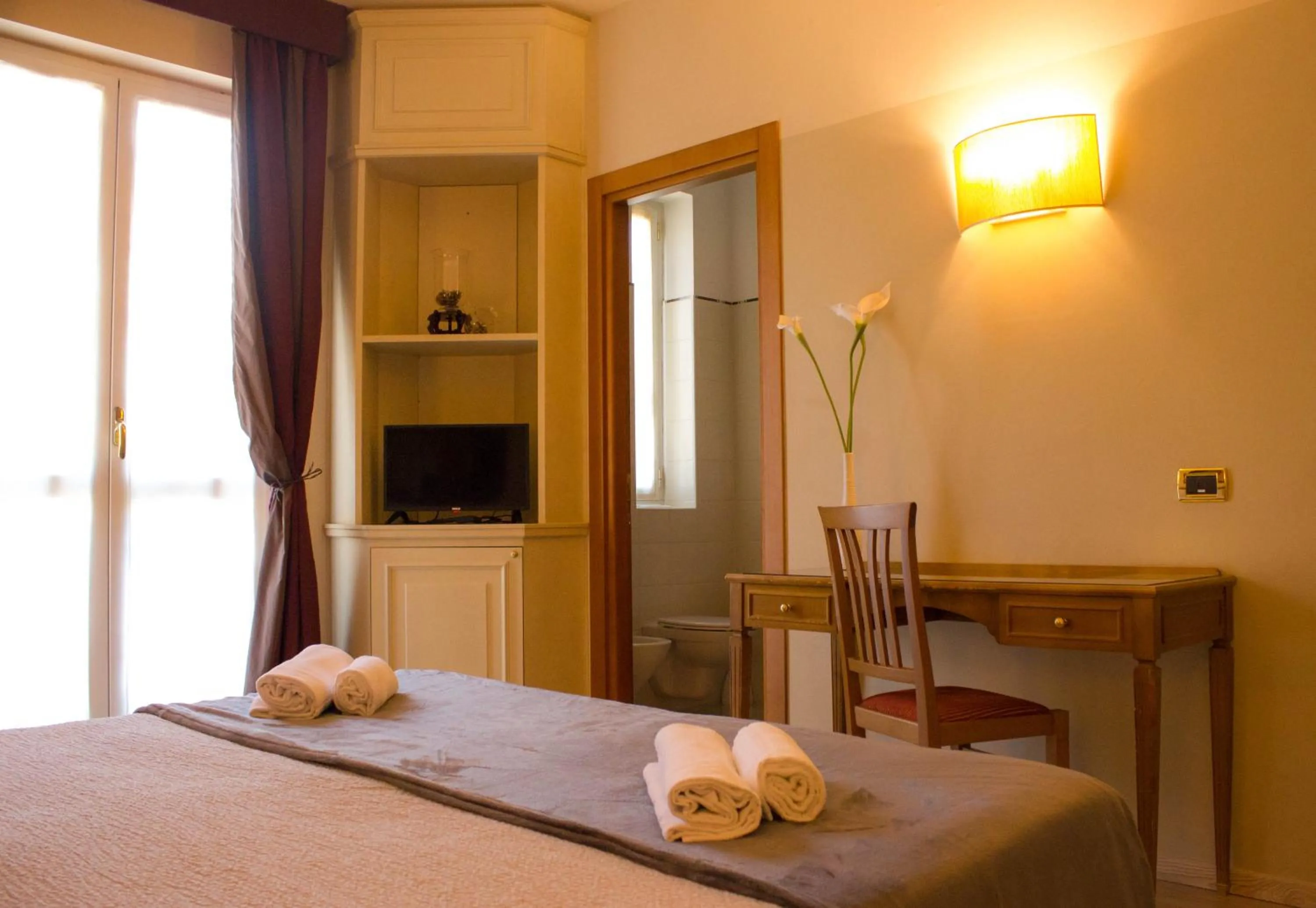 Bed in Hotel Valentino