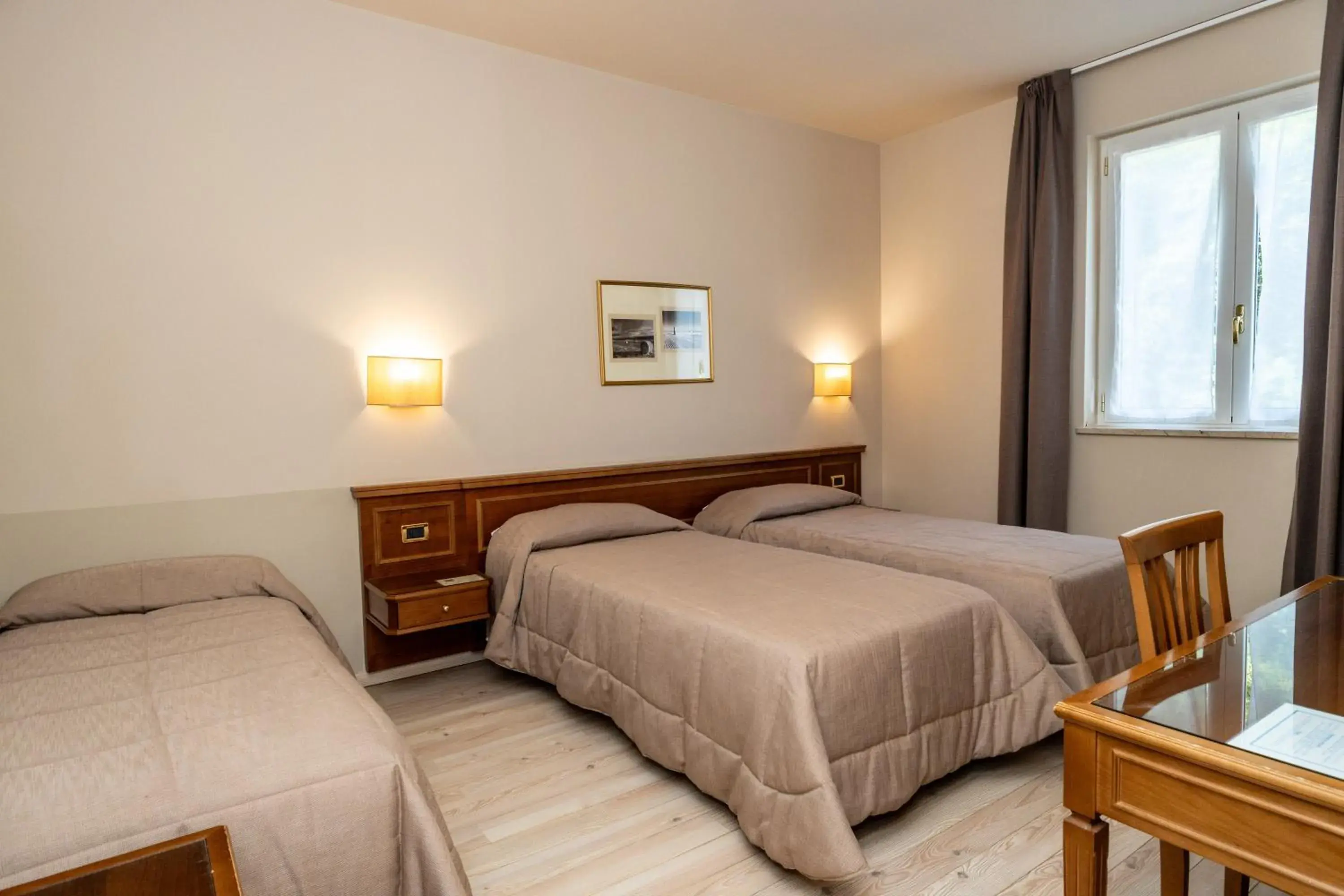 Triple Room - single occupancy in Hotel Valentino Triple Room - single occupancy in Hotel Valentino