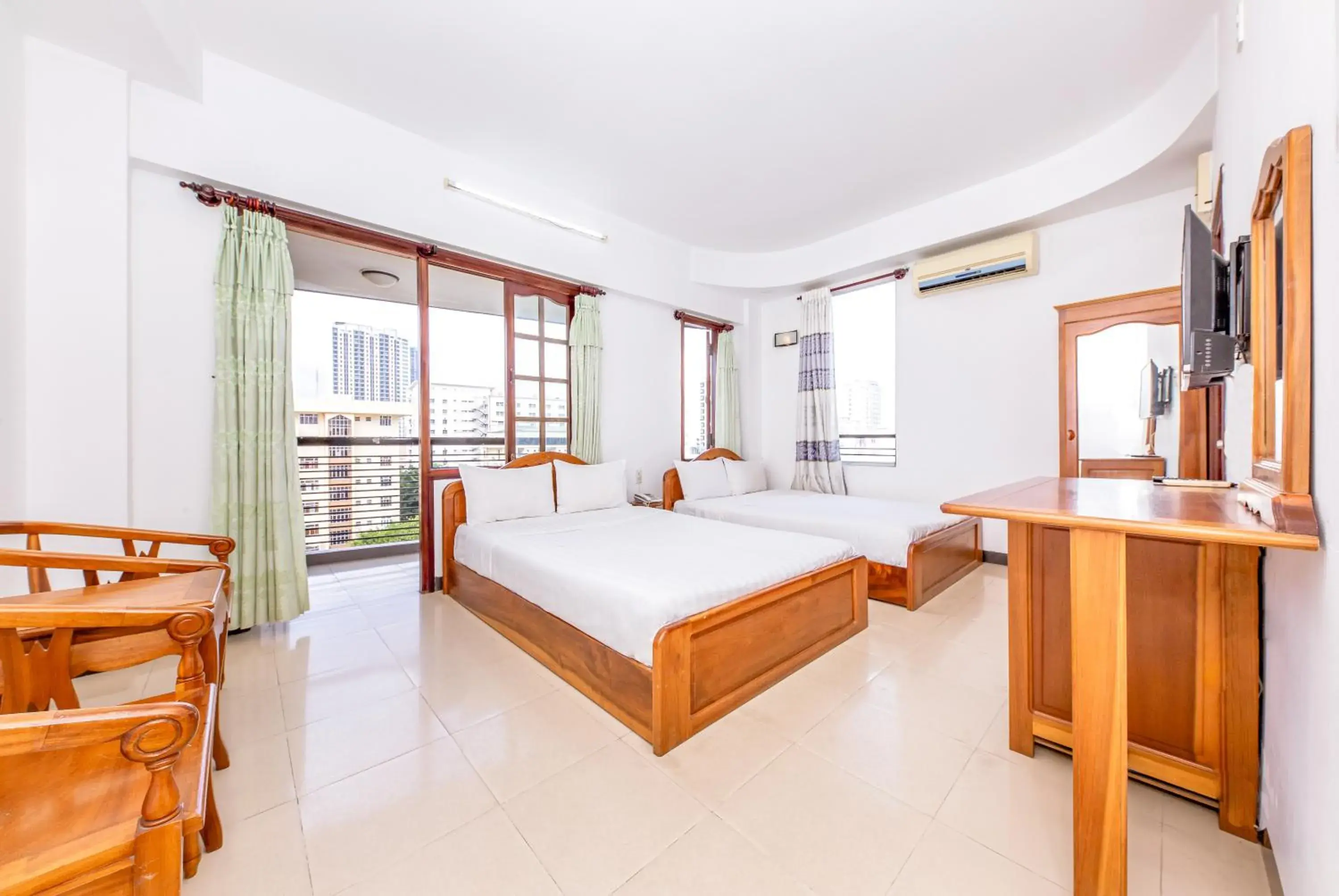 Family Room (4 Adults) in Minh Cat Hotel Family Room (4 Adults) in Minh Cat Hotel