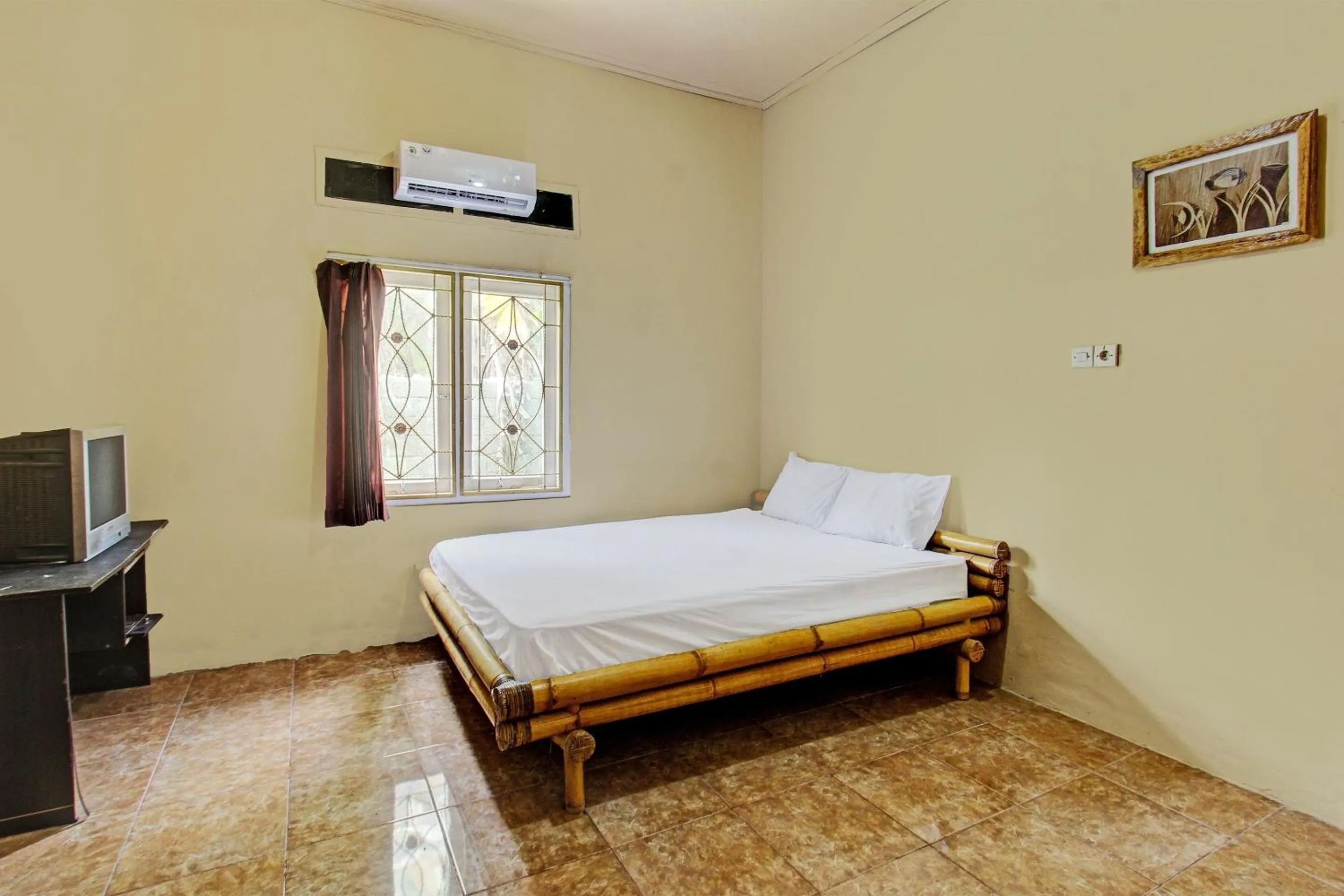 Bedroom, Bed in Hotel O Zahira Homestay Near Ekas Surf School and Service