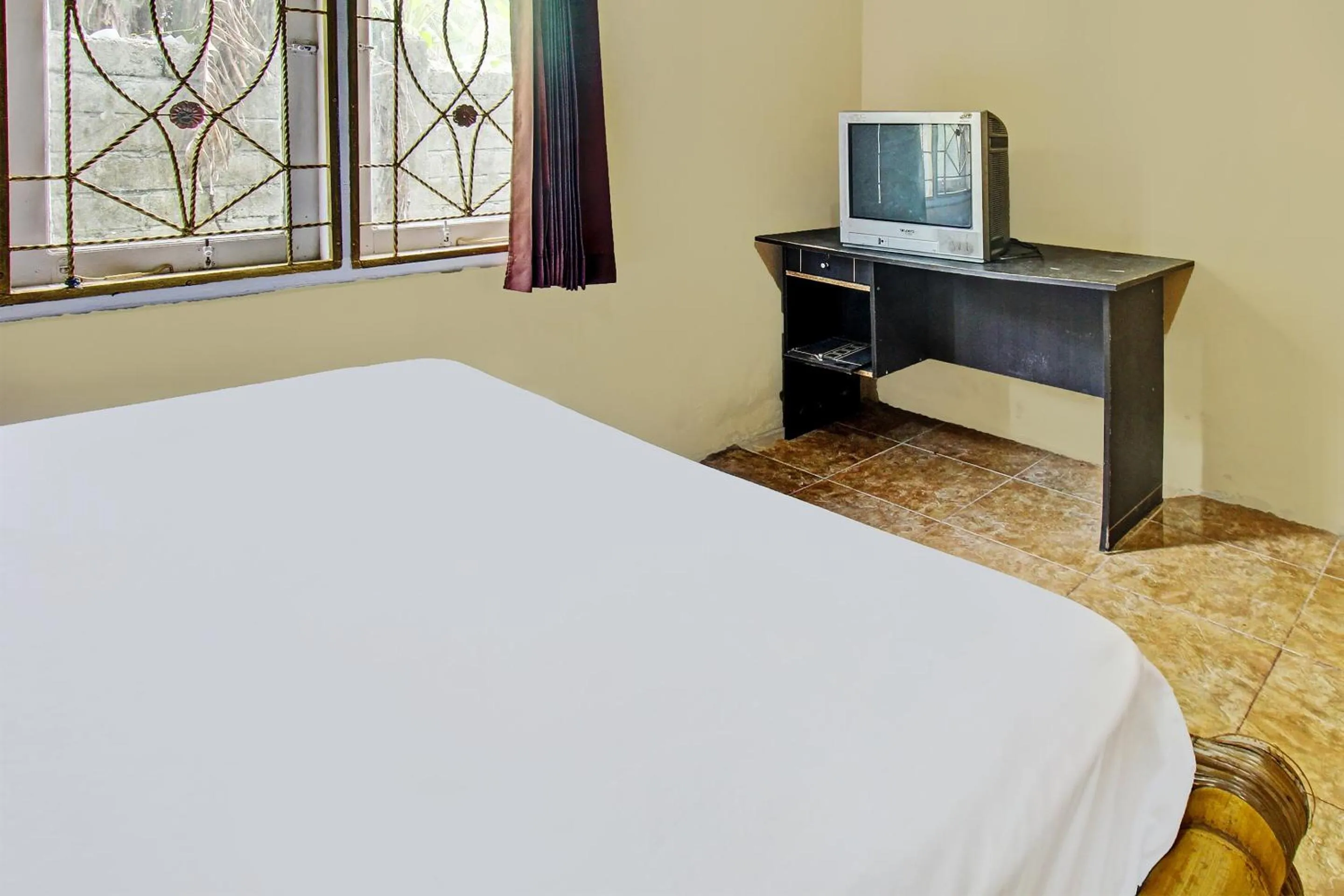 Bedroom, Bed in Hotel O Zahira Homestay Near Ekas Surf School and Service