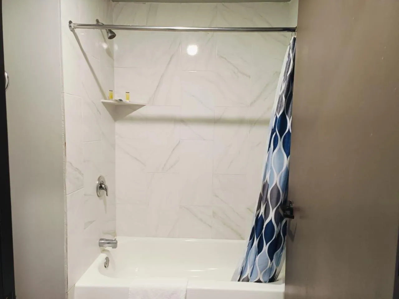 Bathroom in Champion Inn Motel By OYO Hwy 59 Shepherd