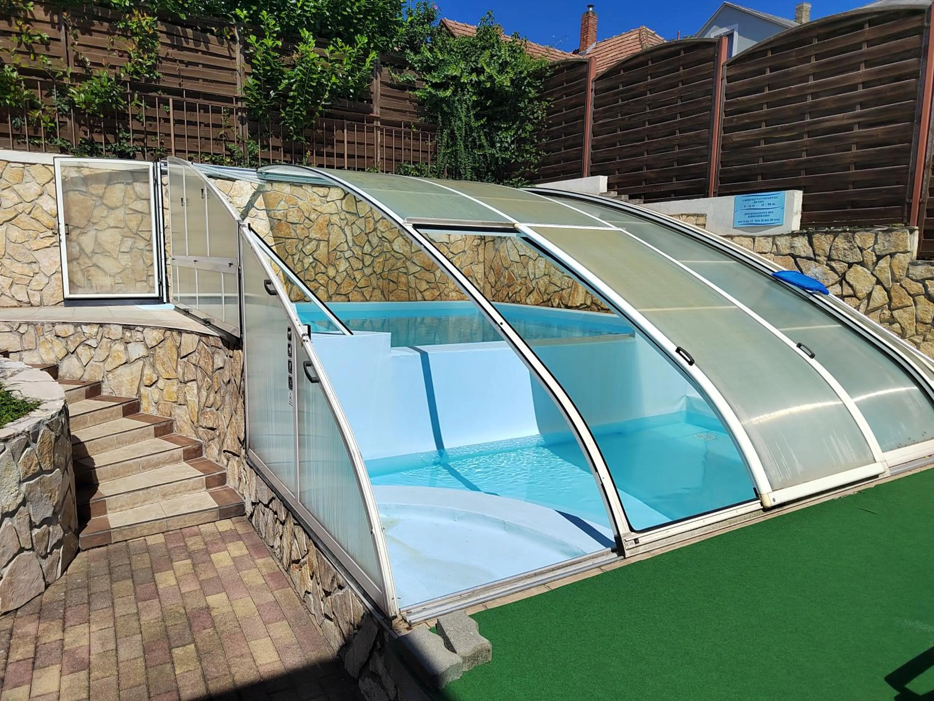 Pool view in Garda Wellness Apartmanház