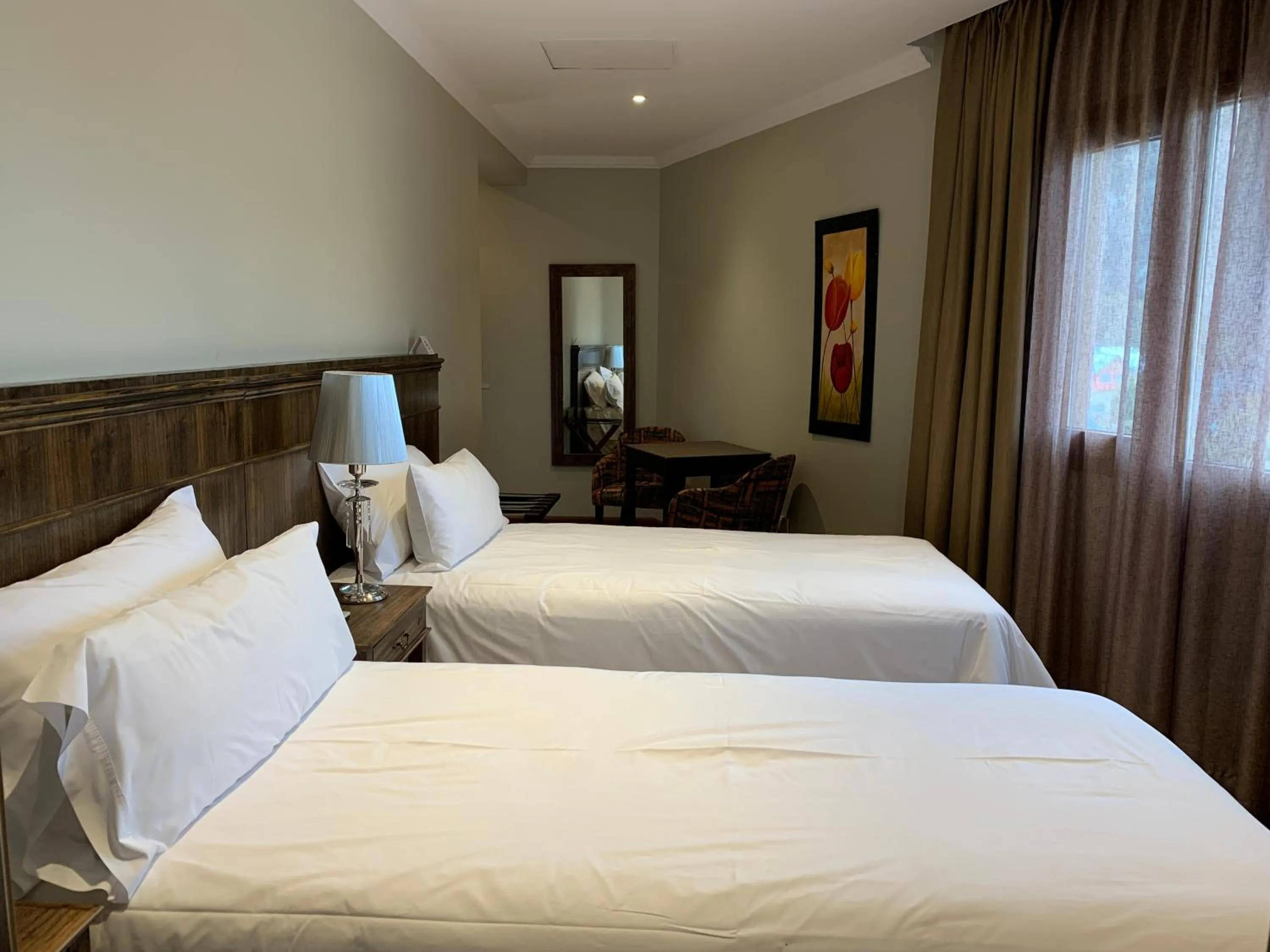 Bed in Chalten Suites Hotel