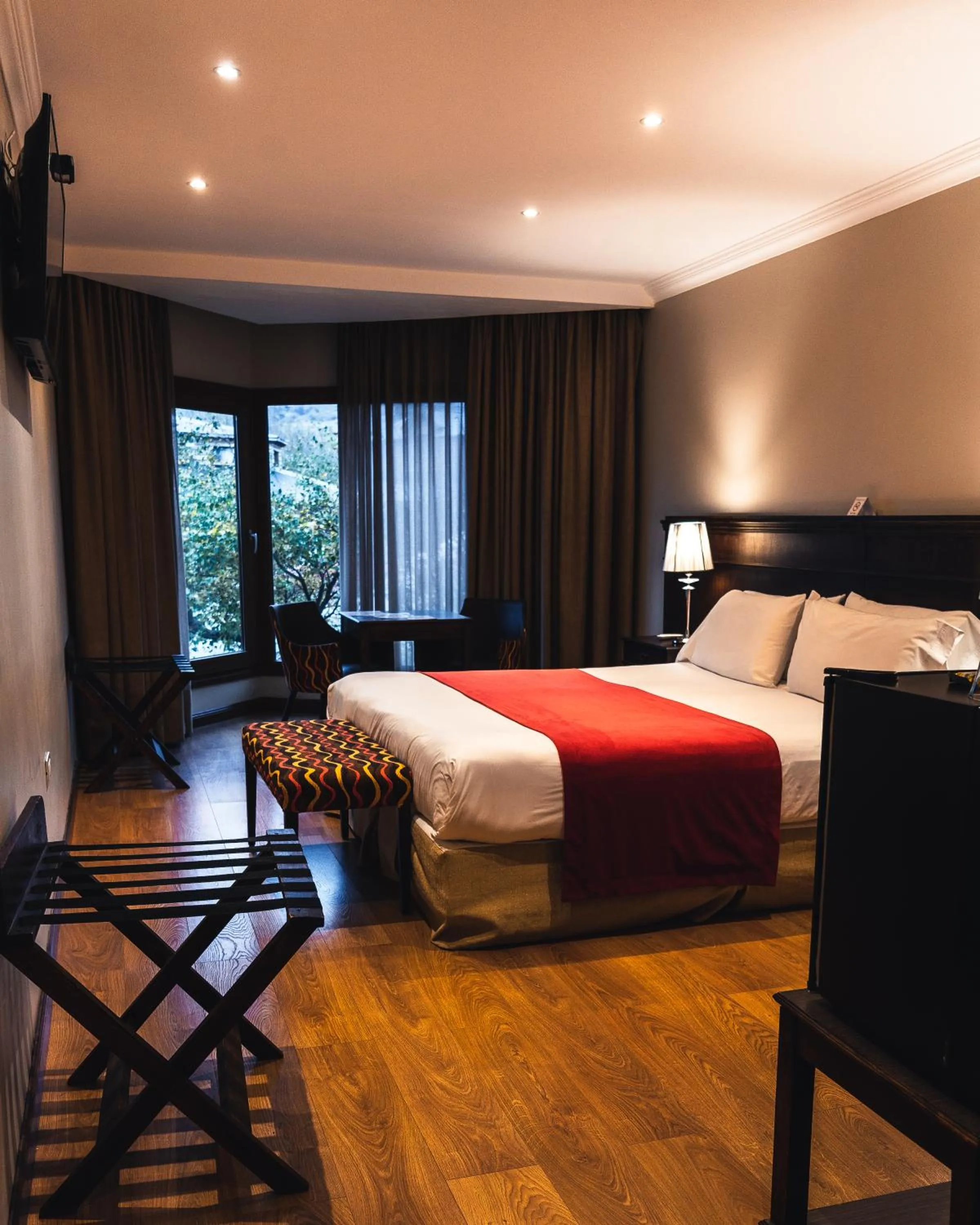 Bed in Chalten Suites Hotel