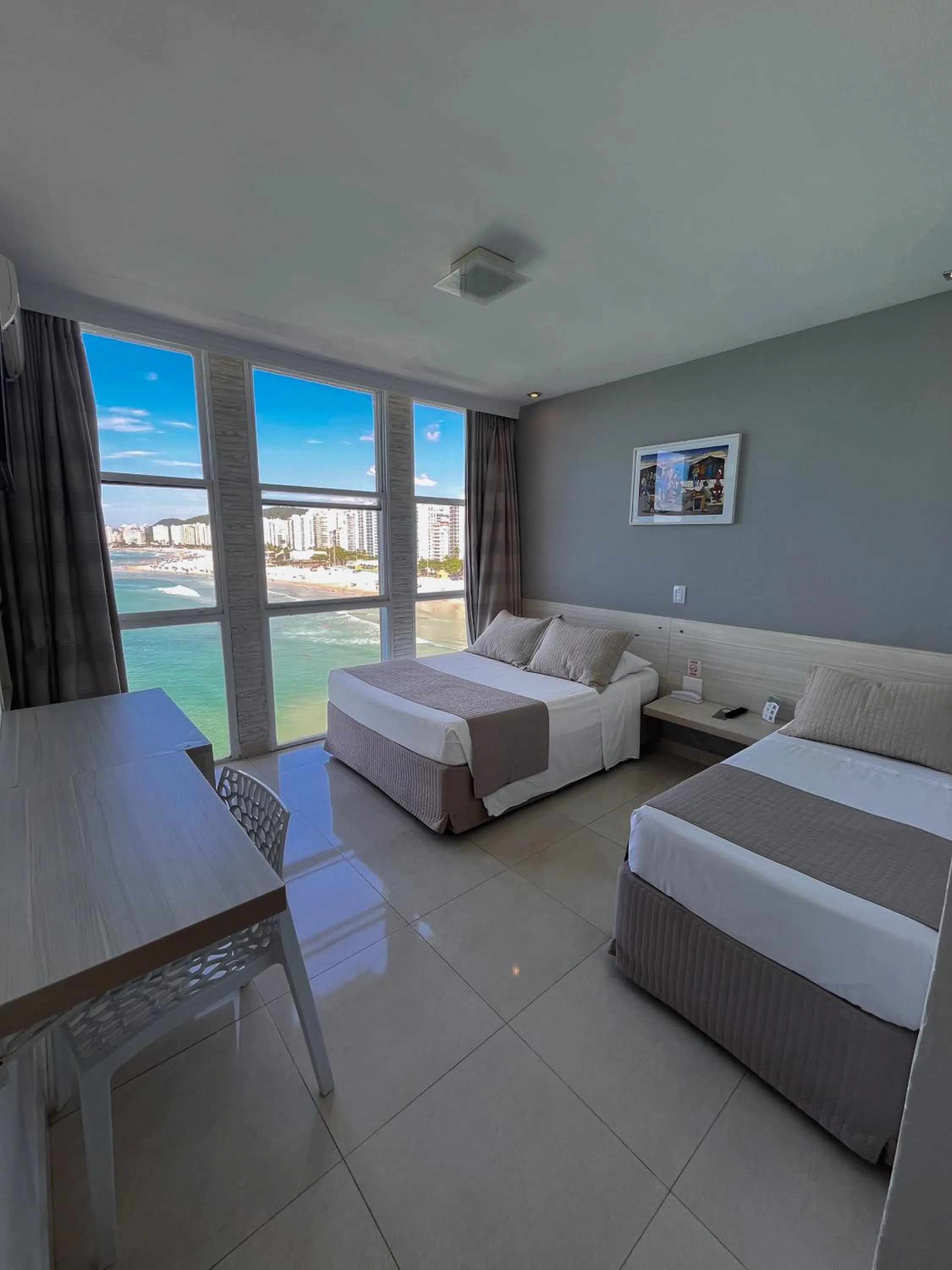 Bed in Grand Hotel Guarujá - A sua Melhor Experiência Beira Mar na Praia!