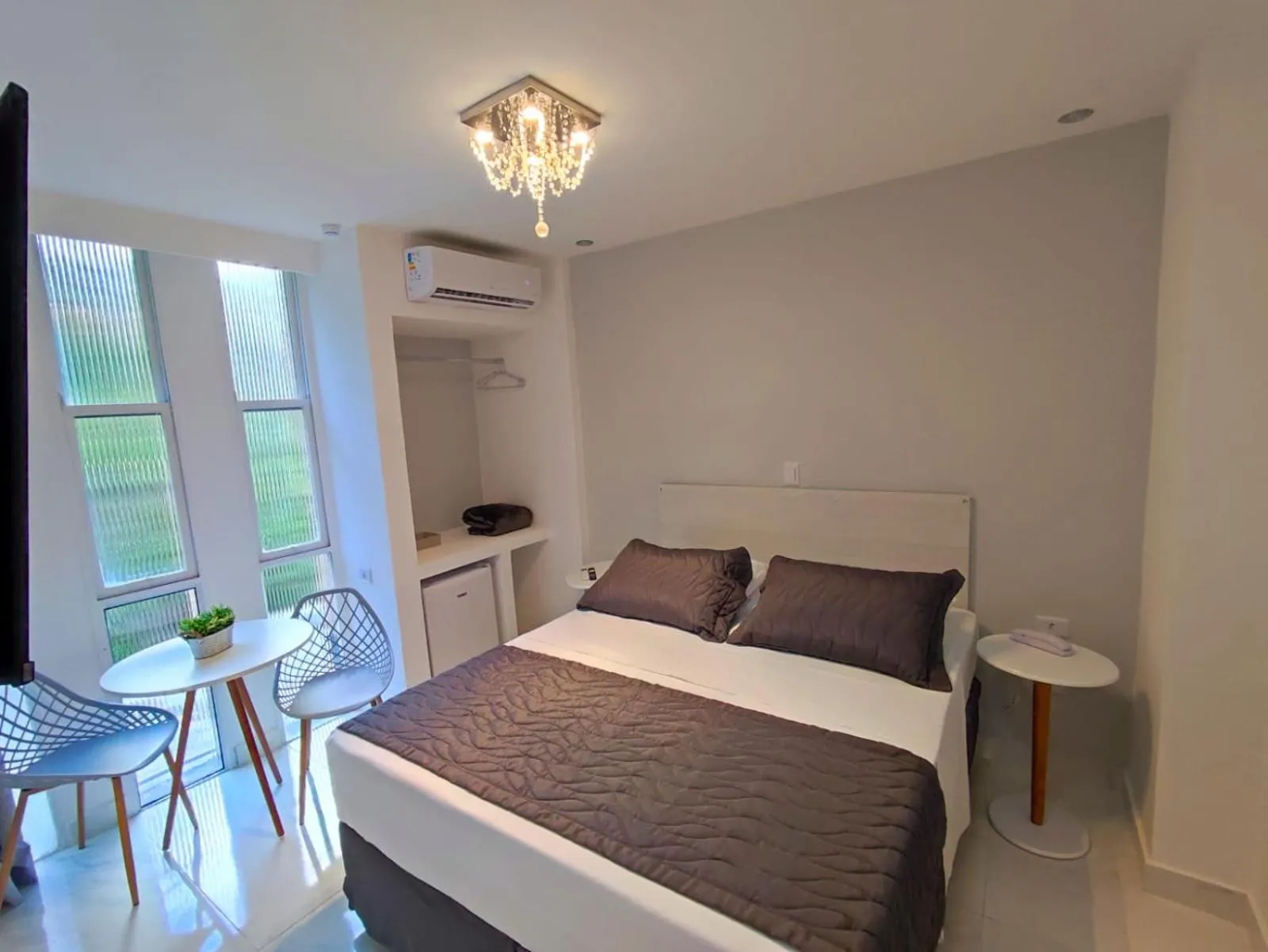 Bed in Grand Hotel Guarujá - A sua Melhor Experiência Beira Mar na Praia!