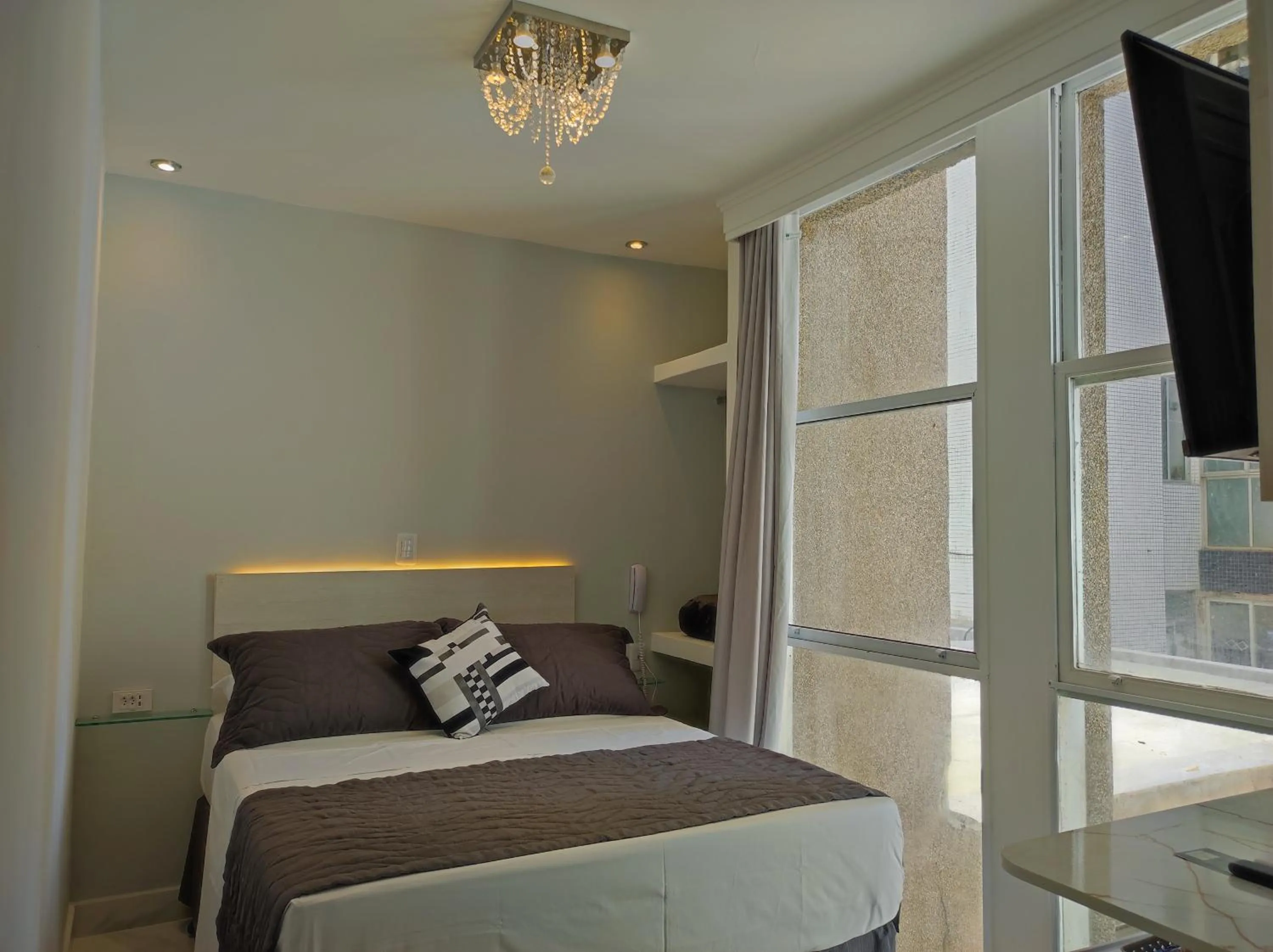 Bed in Grand Hotel Guarujá - A sua Melhor Experiência Beira Mar na Praia!