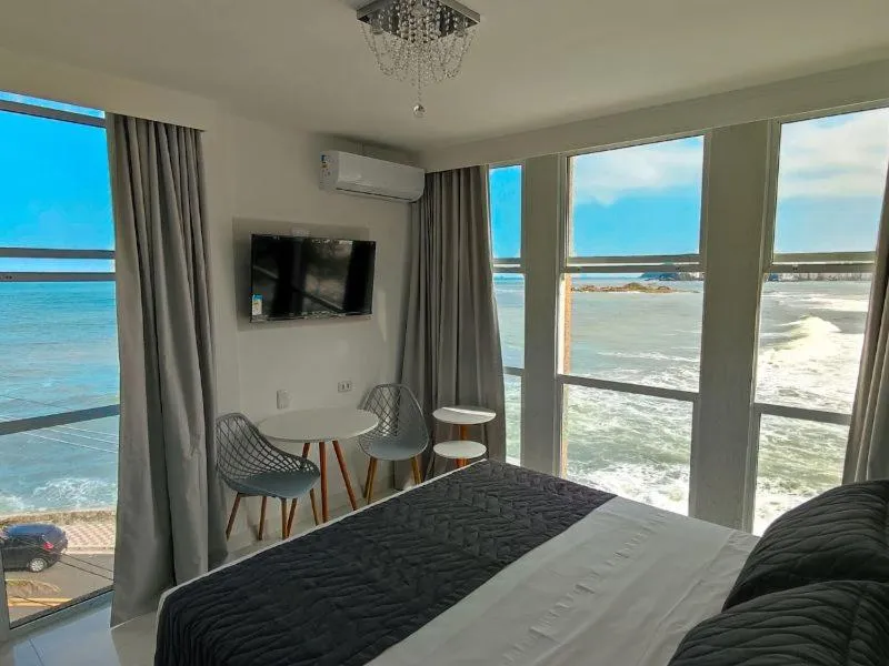 Bed in Grand Hotel Guarujá - A sua Melhor Experiência Beira Mar na Praia!