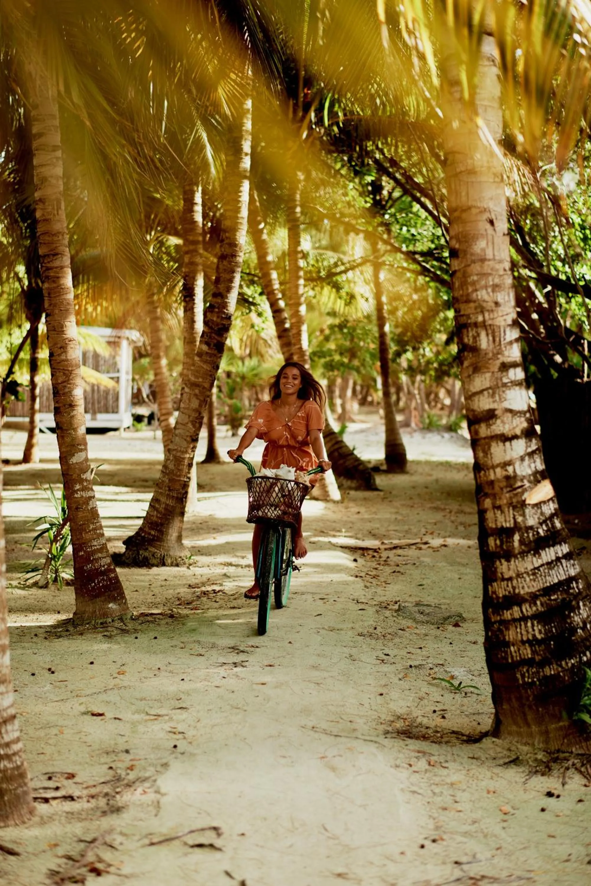 Cycling in Thatch Caye Resort a Muy'Ono Resort